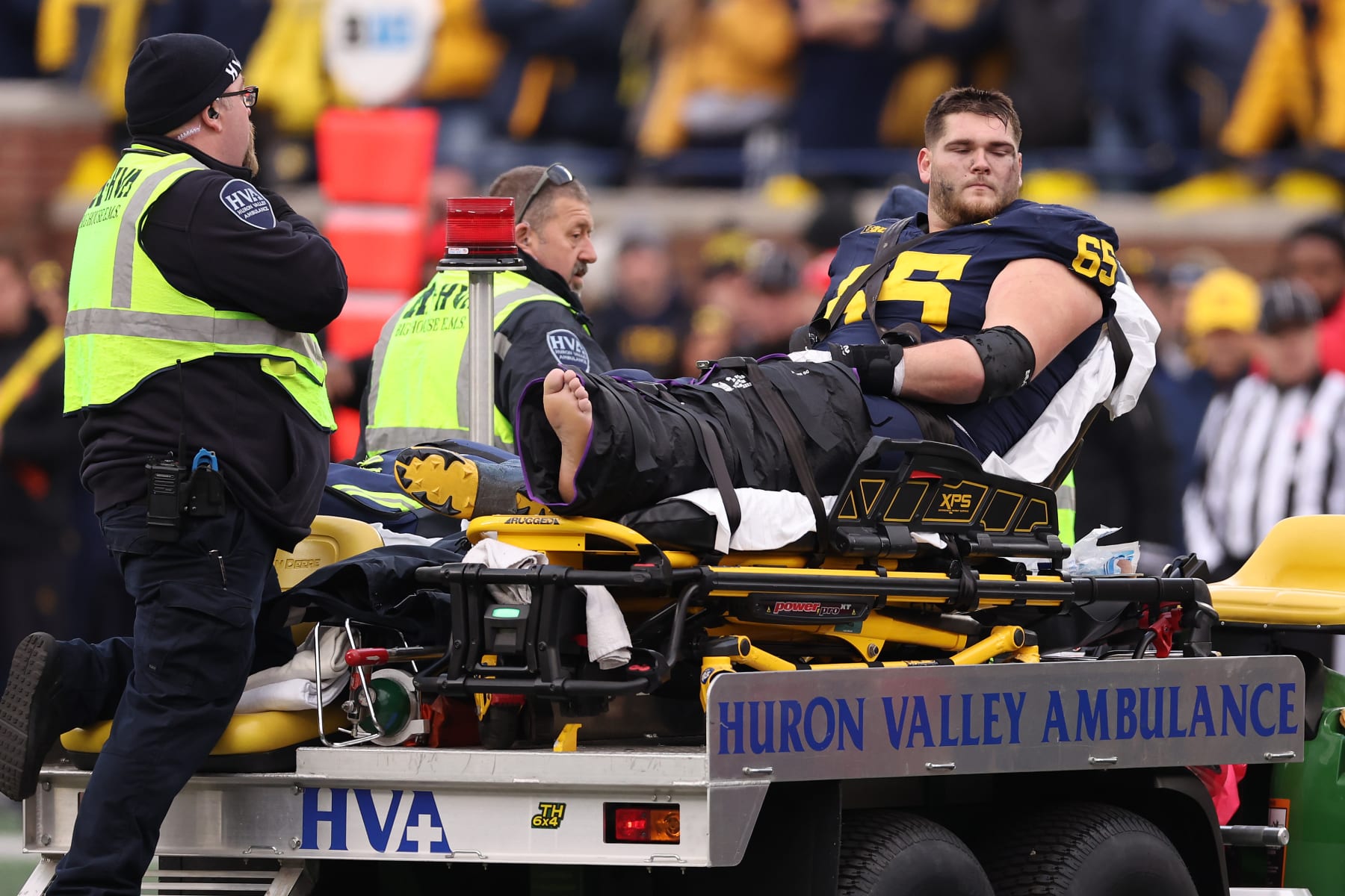 ANN ARBOR, MICHIGAN - NOVEMBER 25: Zak Zinter #65 of the Michigan Wolverines after a injury against the Ohio State Buckeyes at Michigan Stadium on November 25, 2023 in Ann Arbor, Michigan. (Photo by Gregory Shamus/Getty Images)