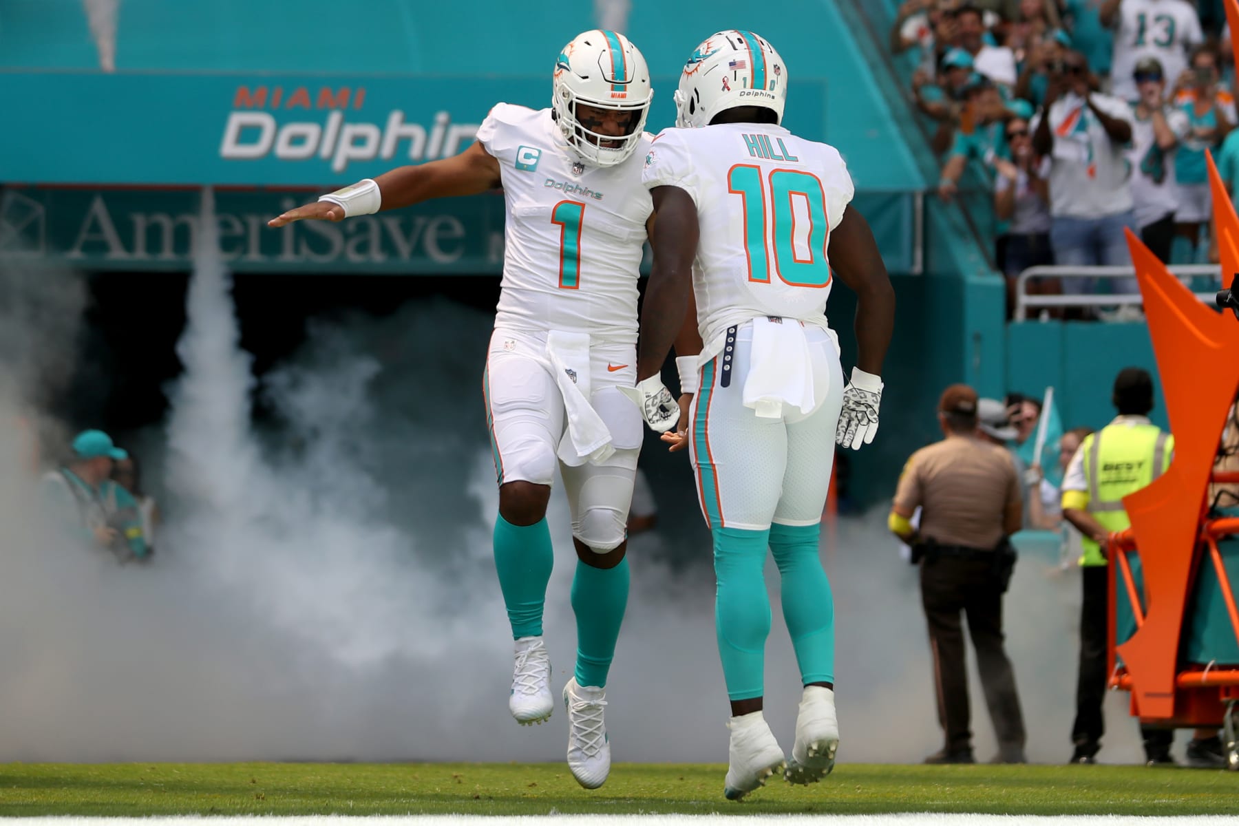 MIAMI GARDENS, FLORIDA - SEPTEMBER 11: Tua Tagovailoa #1 and Tyreek Hill #10 of the Miami Dolphins are introduced prior to playing the New England Patriots at Hard Rock Stadium on September 11, 2022 in Miami Gardens, Florida. (Photo by Megan Briggs/Getty Images)
