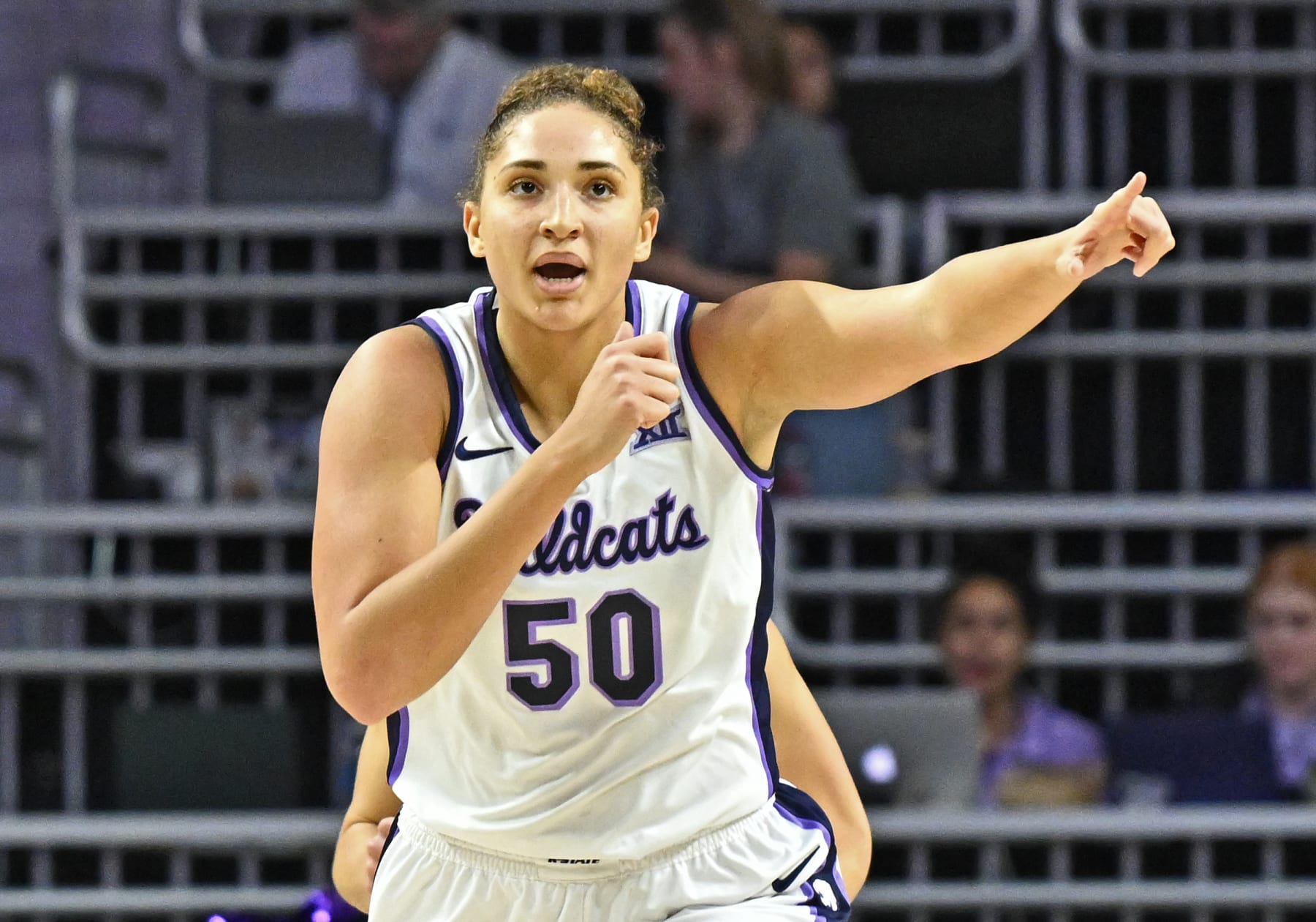 MANHATTAN, KS - NOVEMBER 19: Ayoka Lee #50 of the Kansas State Wildcats reacts after scoring a basket against the Wisconsin Badgers in the first half at Bramlage Coliseum on November 19, 2023 in Manhattan, Kansas. (Photo by Peter Aiken/Getty Images)