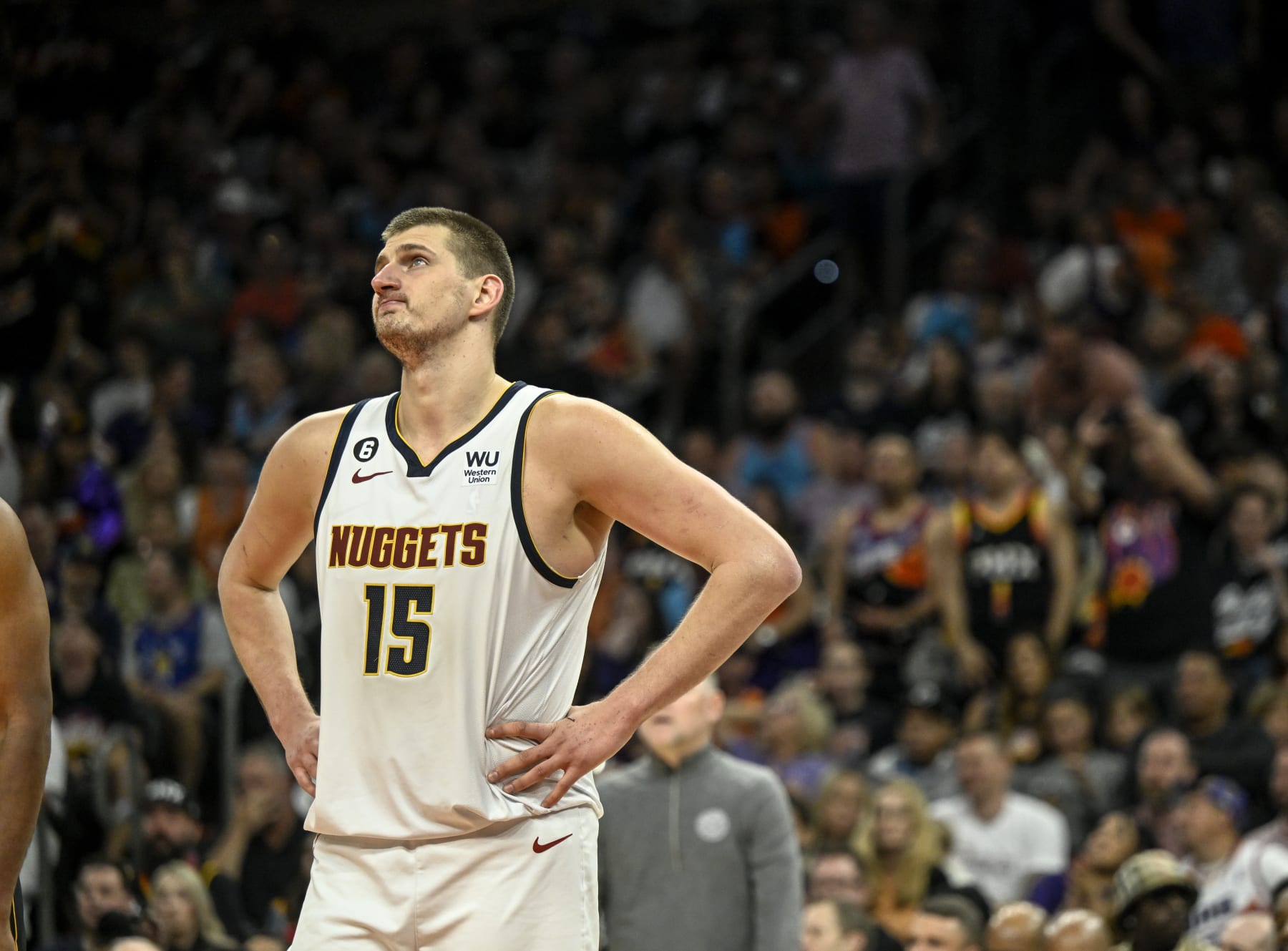 PHOENIX, AZ - MAY 7: Nikola Jokic (15) of the Denver Nuggets reacts to the Nuggets' inability to catch the Phoenix Suns during the fourth quarter of Phoenix's series-tying 129-124 win at Footprint Center in Phoenix on Sunday, May 7, 2023. The series, now knotted at 2-2, heads back to Denver for game five. (Photo by AAron Ontiveroz/The Denver Post)