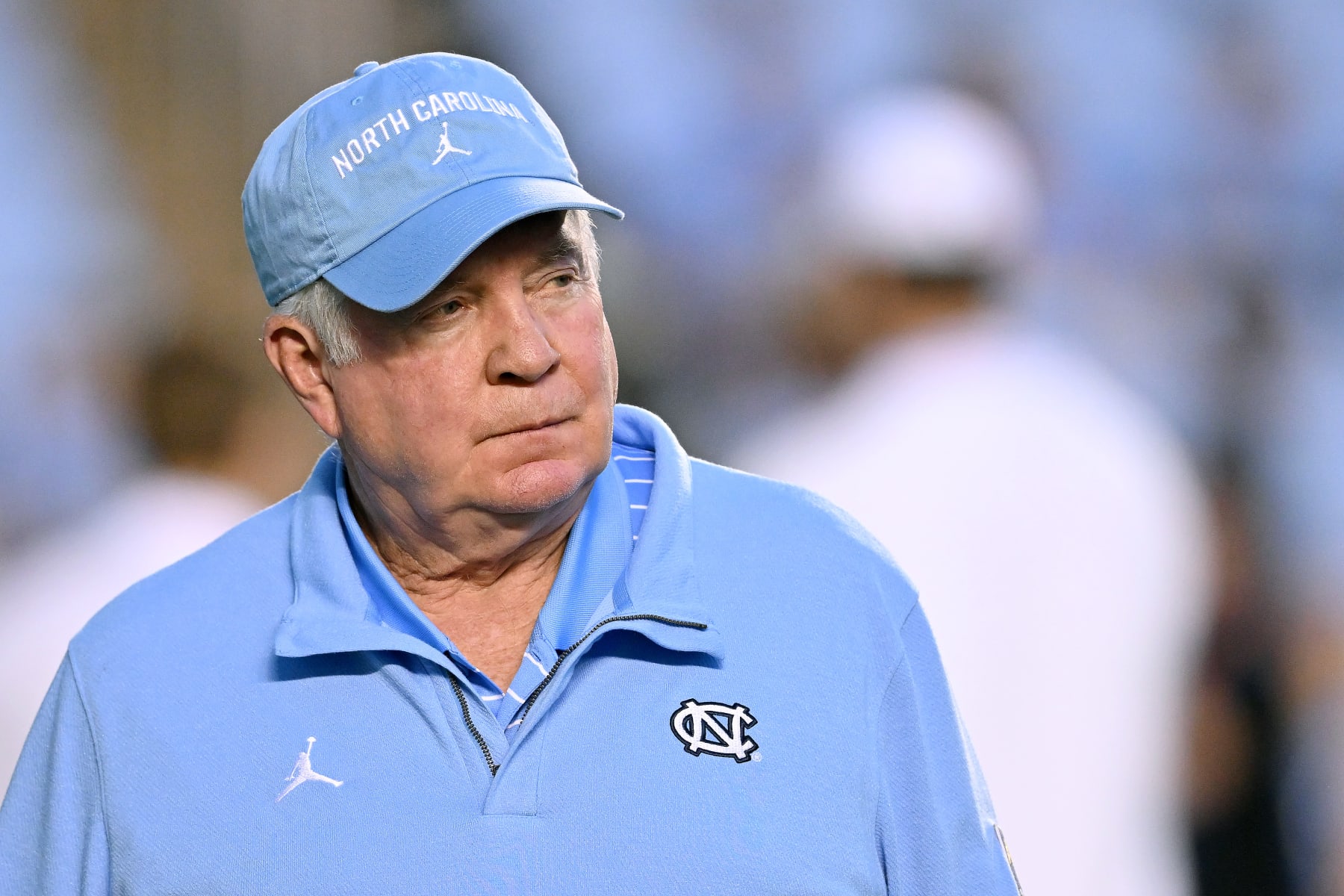 CHAPEL HILL, NORTH CAROLINA - AUGUST 27: Head coach Mack Brown of the North Carolina Tar Heels watches his team warm up before their game against the Florida A&M Rattlers at Kenan Memorial Stadium on August 27, 2022 in Chapel Hill, North Carolina. (Photo by Grant Halverson/Getty Images)