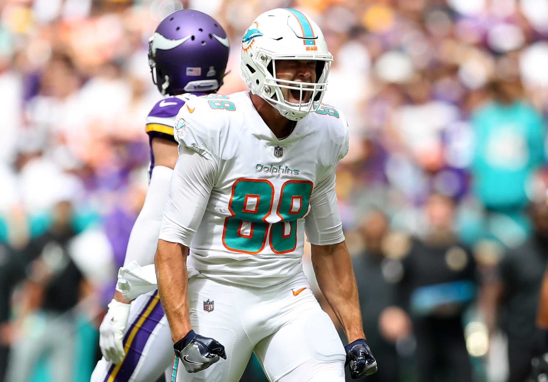MIAMI GARDENS, FLORIDA - OCTOBER 16: Mike Gesicki #88 of the Miami Dolphins reacts after a catch for a first down against the Minnesota Vikings during the first quarter at Hard Rock Stadium on October 16, 2022 in Miami Gardens, Florida. (Photo by Megan Briggs/Getty Images)