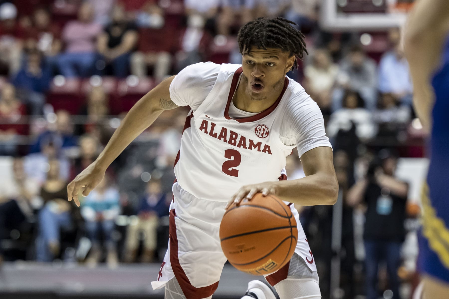 Alabama forward Darius Miles (2) works inside against South Dakota State during the second half of an NCAA college basketball game, Friday, Nov. 12, 2021, in Tuscaloosa, Ala. (AP Photo/Vasha Hunt)