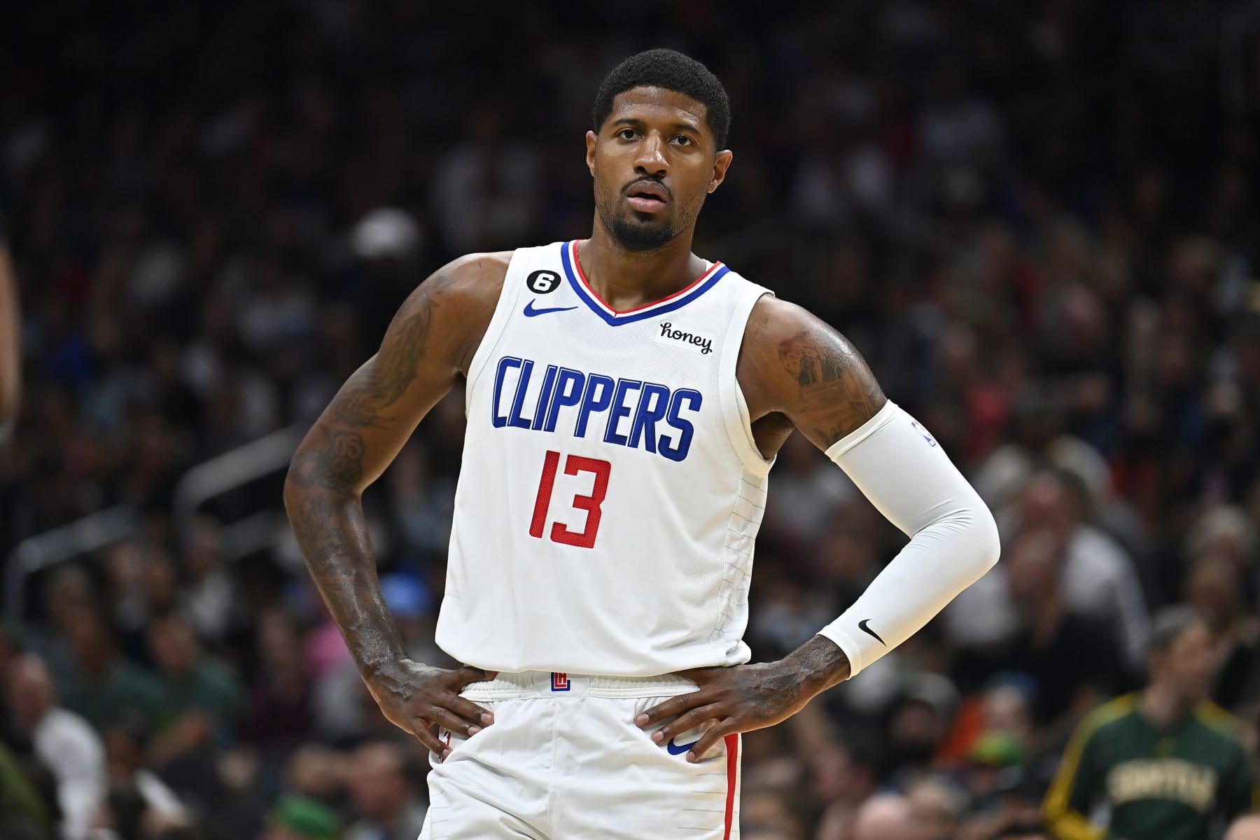 SEATTLE, WASHINGTON - OCTOBER 03: Paul George #13 of the Los Angeles Clippers looks on during the first half of the preseason game against the Portland Trail Blazers at Climate Pledge Arena on October 03, 2022 in Seattle, Washington. The Los Angeles Clippers won 102-97. NOTE TO USER: User expressly acknowledges and agrees that, by downloading and or using this photograph, User is consenting to the terms and conditions of the Getty Images License Agreement. (Photo by Alika Jenner/Getty Images)