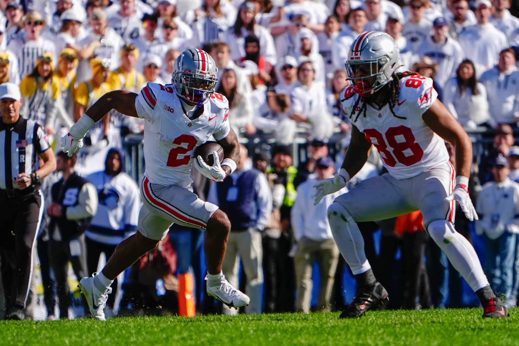 UNIVERSITY PARK, PA - NOVEMBER 02: Ohio State Buckeyes Wide Receiver Emeka Egbuka (2) returns a punt during the first half of the College Football game between the Ohio State Buckeyes and the Penn State Nittany Lions on November 2, 2024, at Beaver Stadium in University Park, PA. (Photo by Gregory Fisher/Icon Sportswire via Getty Images)