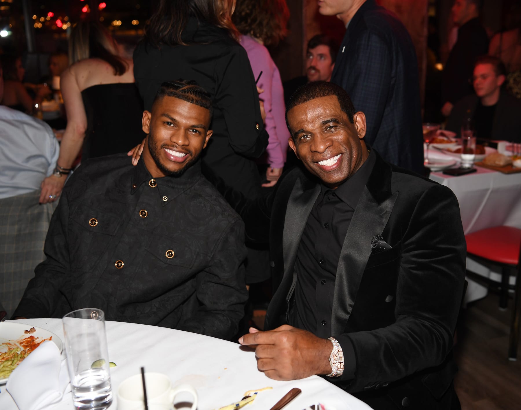 LAS VEGAS, NEVADA - FEBRUARY 08: Shilo Sanders and Deion Sanders attend RAO's Gridiron Club Prime Night Hosted By Deion Sanders at Paris Las Vegas on February 08, 2024 in Las Vegas, Nevada. (Photo by Denise Truscello/Getty Images for RAO's  )