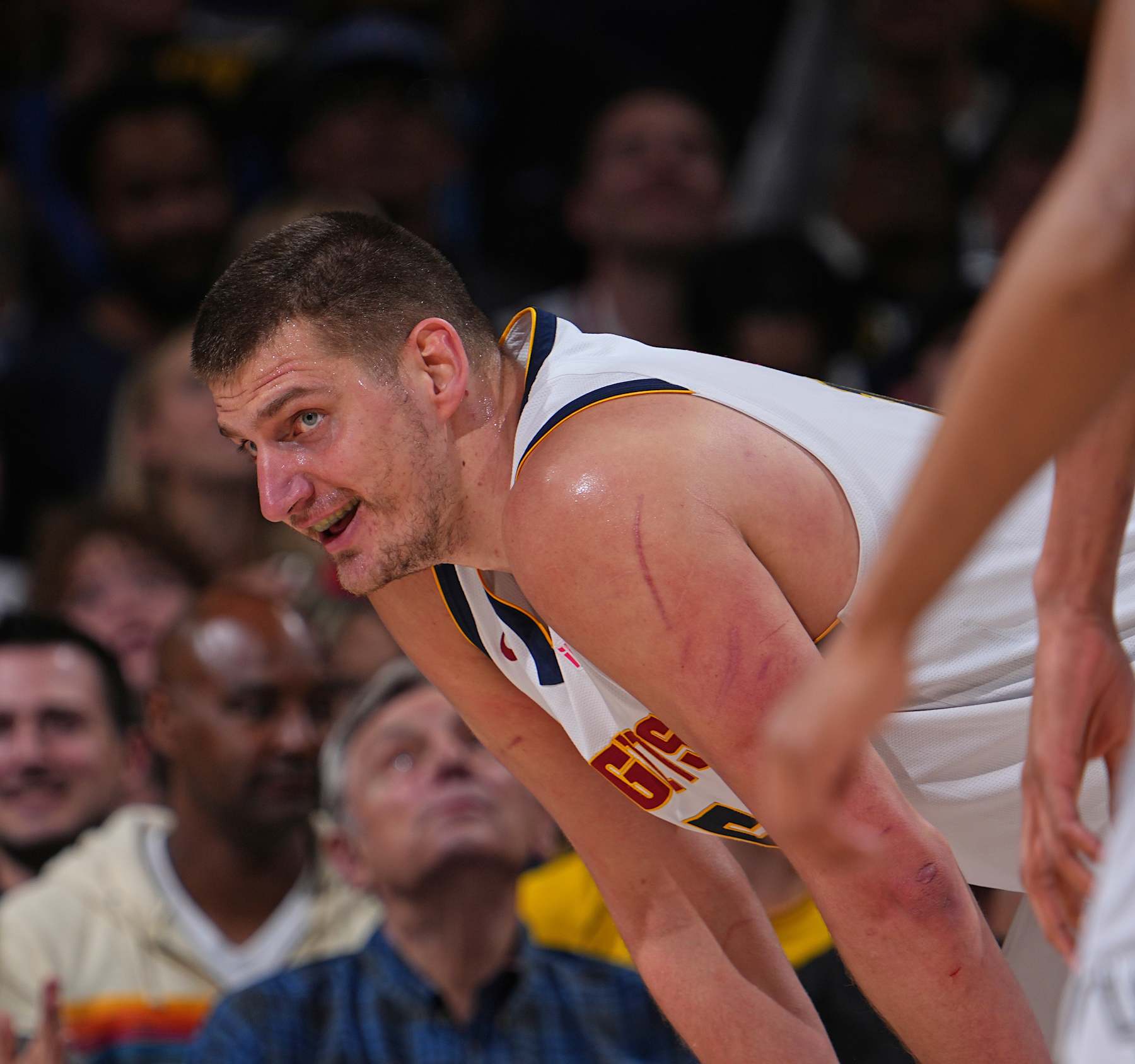 DENVER, CO - APRIL 2: Nikola Jokic #15 of the Denver Nuggets smiles during the game against the San Antonio Spurs on April 2, 2024 at the Ball Arena in Denver, Colorado. NOTE TO USER: User expressly acknowledges and agrees that, by downloading and/or using this Photograph, user is consenting to the terms and conditions of the Getty Images License Agreement. Mandatory Copyright Notice: Copyright 2024 NBAE (Photo by Bart Young/NBAE via Getty Images)