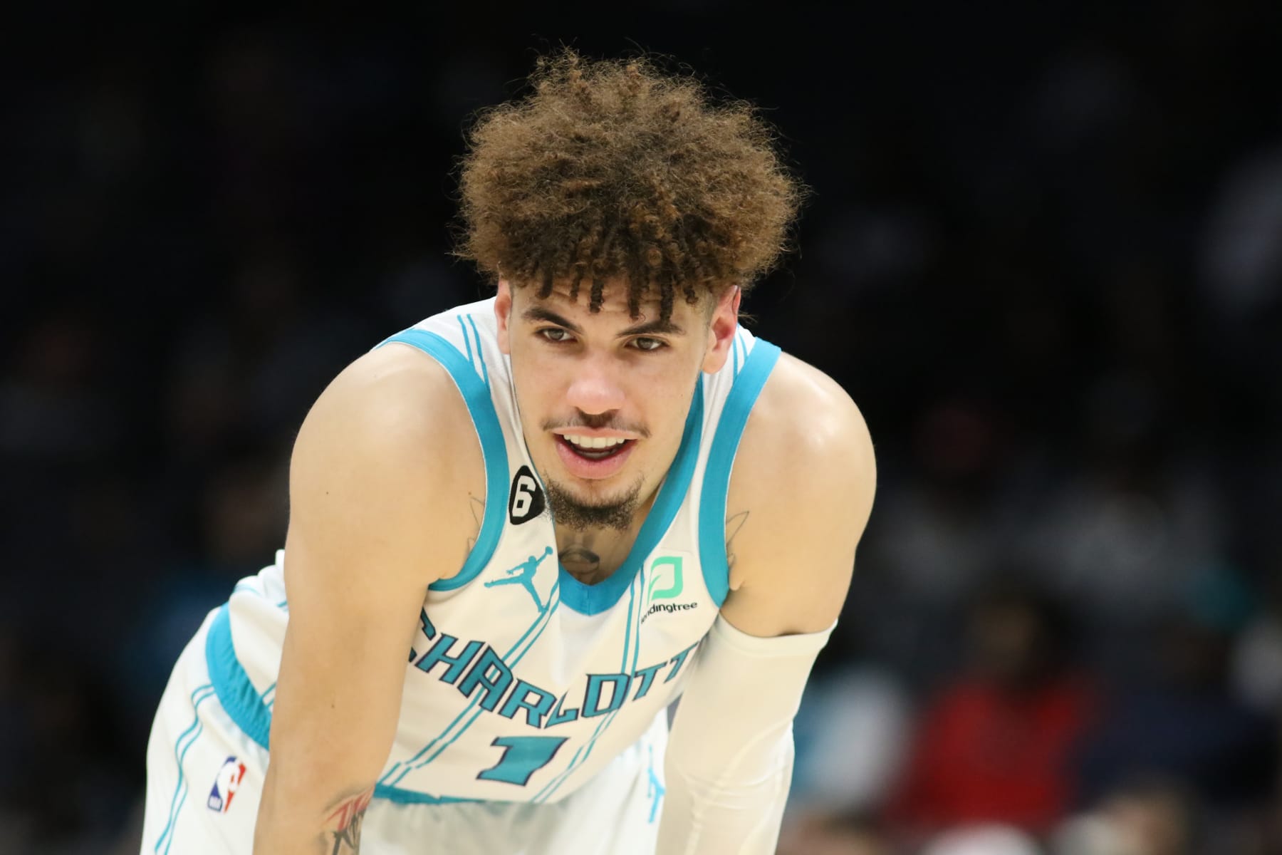 CHARLOTTE, NC - OCTOBER 10: LaMelo Ball #1 of the Charlotte Hornets looks on during a preseason game against the Washington Wizards on October 10, 2022 at Spectrum Center in Charlotte, North Carolina. NOTE TO USER: User expressly acknowledges and agrees that, by downloading and or using this photograph, User is consenting to the terms and conditions of the Getty Images License Agreement.  Mandatory Copyright Notice:  Copyright 2022 NBAE (Photo by Brock Williams-Smith/NBAE via Getty Images)