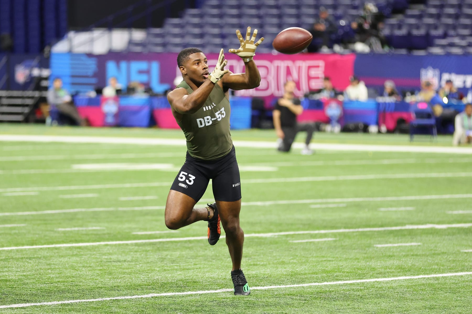 INDIANAPOLIS, INDIANA - MARCH 01: Kamren Kinchens #DB53 of Miami-Fl participates in a drill during the NFL Combine at Lucas Oil Stadium on March 01, 2024 in Indianapolis, Indiana. (Photo by Stacy Revere/Getty Images)
