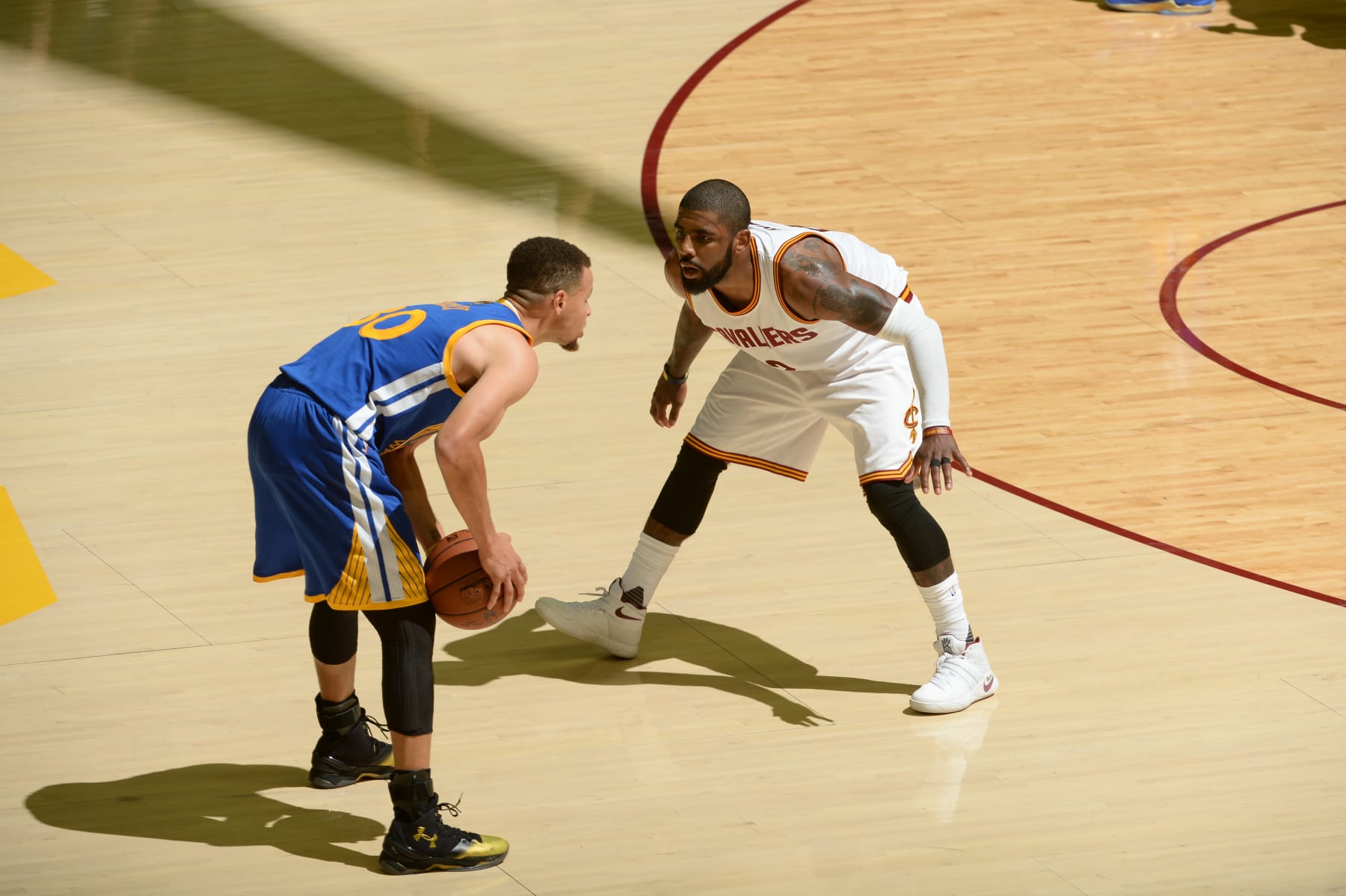 CLEVELAND, OH - JUNE 16: Stephen Curry #30 of the Golden State Warriors handles the ball against the Kyrie Irving #2 of the Cleveland Cavaliers in Game Six of the 2015 NBA Finals on June 16, 2016 at Quicken Loans Arena in Cleveland, Ohio. NOTE TO USER: User expressly acknowledges and agrees that, by downloading and/or using this photograph, user is consenting to the terms and conditions of the Getty Images License Agreement. Mandatory Copyright Notice: Copyright 2015 NBAE (Photo by Garrett Ellwood/NBAE via Getty Images)