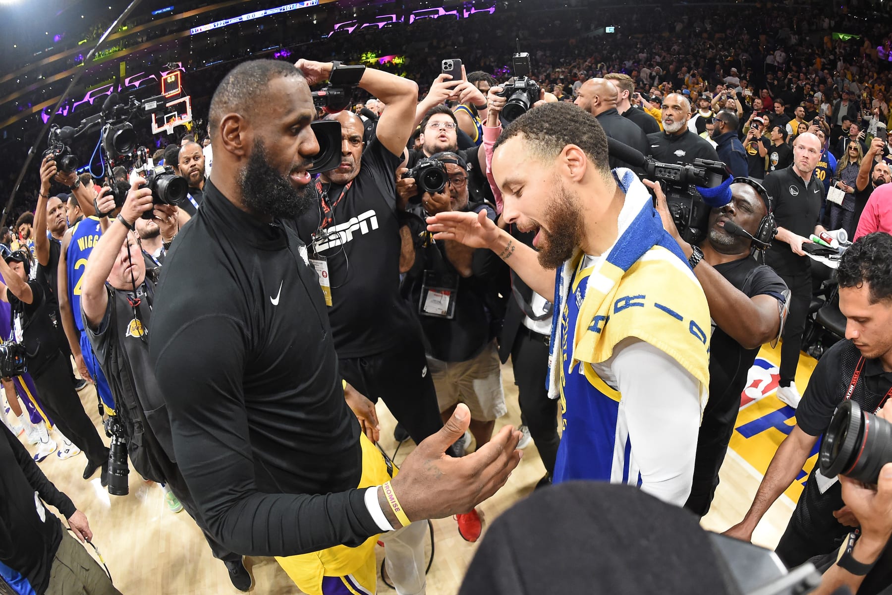 LOS ANGELES, CA - MAY 12: LeBron James #6 of the Los Angeles Lakers talks with Stephen Curry #30 of the Golden State Warriors after Game 6 of the Western Conference Semi-Finals 2023 NBA Playoffs on May 12, 2023 at Crypto.Com Arena in Los Angeles, California. NOTE TO USER: User expressly acknowledges and agrees that, by downloading and/or using this Photograph, user is consenting to the terms and conditions of the Getty Images License Agreement. Mandatory Copyright Notice: Copyright 2023 NBAE (Photo by Andrew D. Bernstein/NBAE via Getty Images)