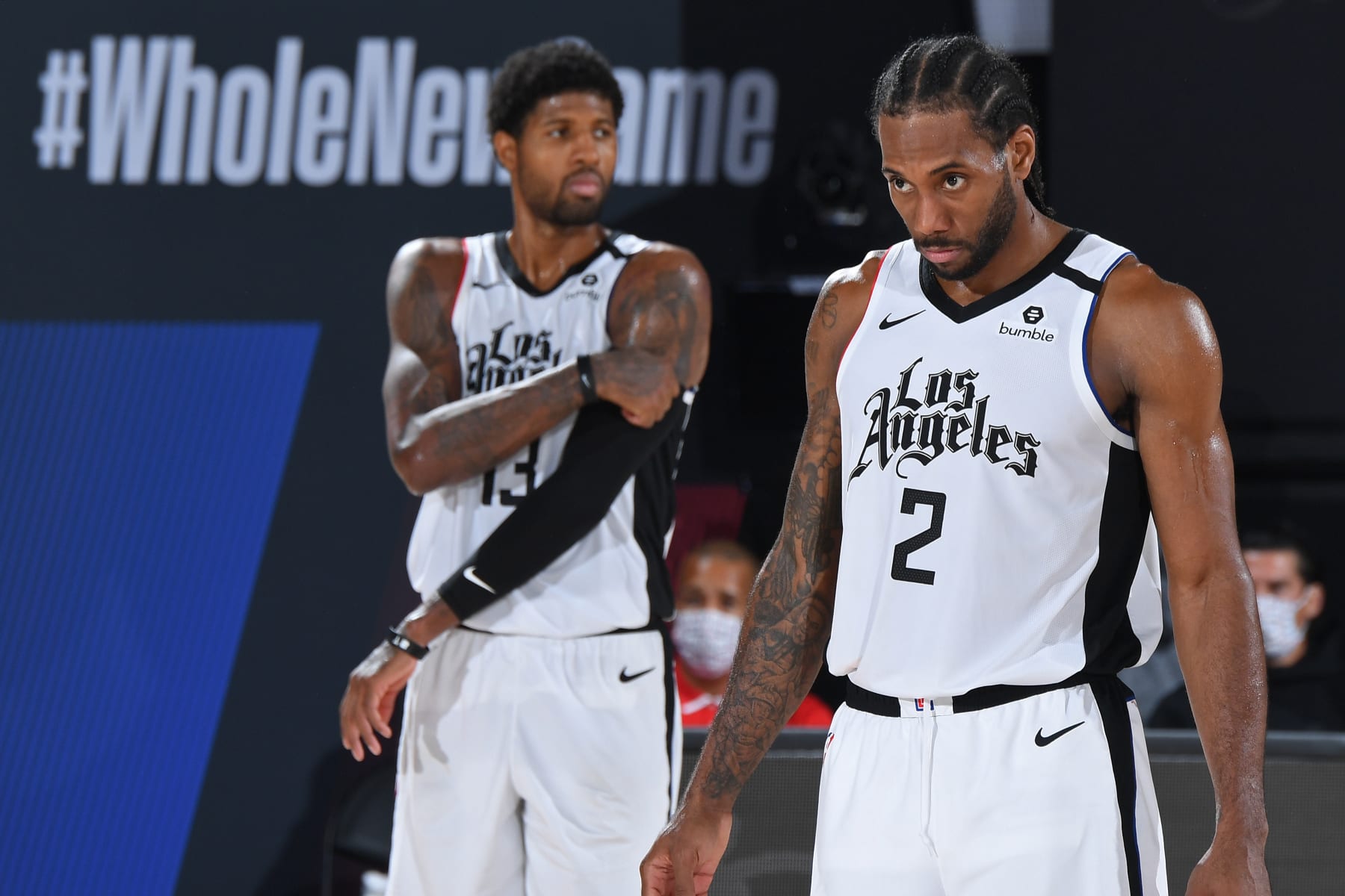 Orlando, FL - SEPTEMBER 13: Kawhi Leonard #2 of the LA Clippers and Paul George #13 of the LA Clippers seen on court during Game Six of the Western Conference Semifinals on September 13, 2020 in Orlando, Florida at AdventHealth Arena. NOTE TO USER: User expressly acknowledges and agrees that, by downloading and/or using this Photograph, user is consenting to the terms and conditions of the Getty Images License Agreement. Mandatory Copyright Notice: Copyright 2020 NBAE (Photo by Andrew D. Bernstein/NBAE via Getty Images)