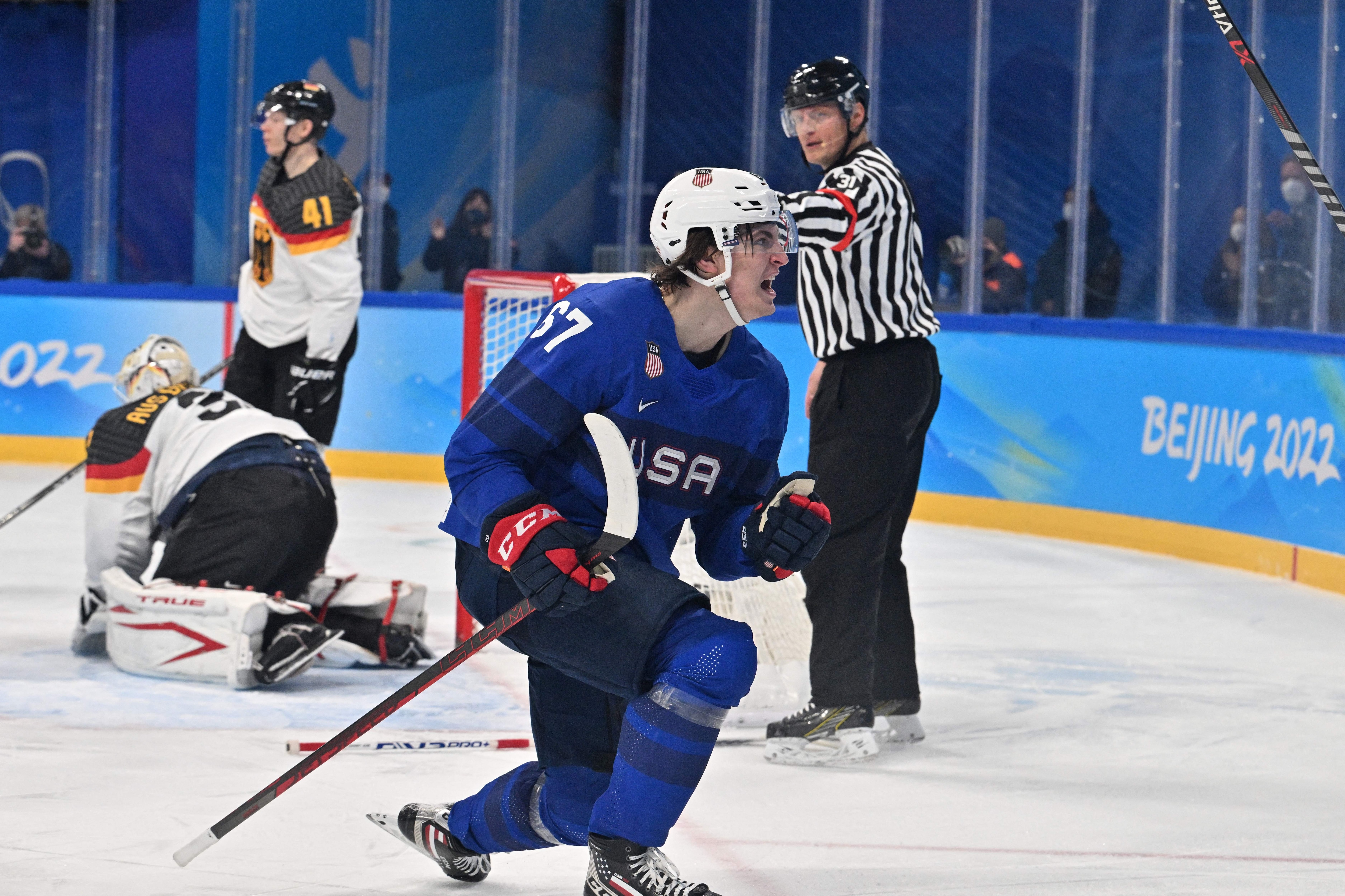 USA's Matt Knies celebrates after scoring the 2-1 goal during the men's preliminary round group A match of the Beijing 2022 Winter Olympic Games ice hockey competition between USA and Germany, at the Wukesong Sports Centre in Beijing on February 13, 2022. (Photo by ANTHONY WALLACE / AFP) (Photo by ANTHONY WALLACE/AFP via Getty Images)