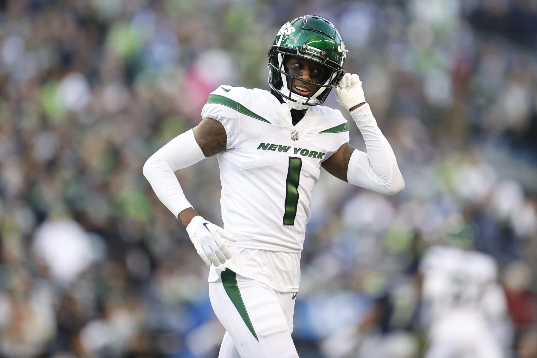 SEATTLE, WASHINGTON - JANUARY 01: Sauce Gardner #1 of the New York Jets walks off the field during the fourth quarter in the game against the Seattle Seahawks at Lumen Field on January 01, 2023 in Seattle, Washington. (Photo by Steph Chambers/Getty Images)