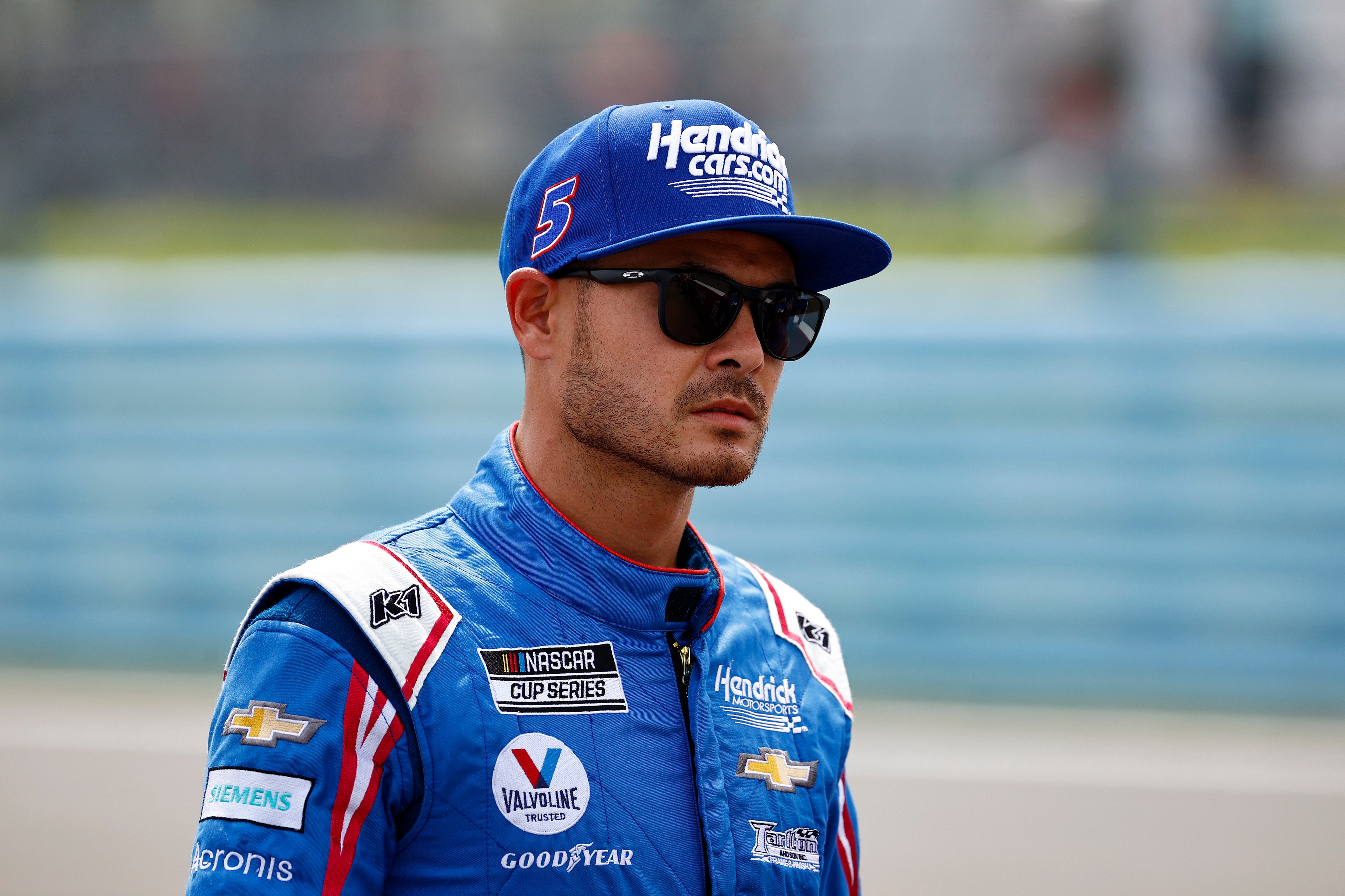 WATKINS GLEN, NEW YORK - AUGUST 08: Kyle Larson, driver of the #5 HendrickCars.com Chevrolet, waits on the grid prior to the NASCAR Cup Series Go Bowling at The Glen at Watkins Glen International on August 08, 2021 in Watkins Glen, New York. (Photo by Jared C. Tilton/Getty Images)