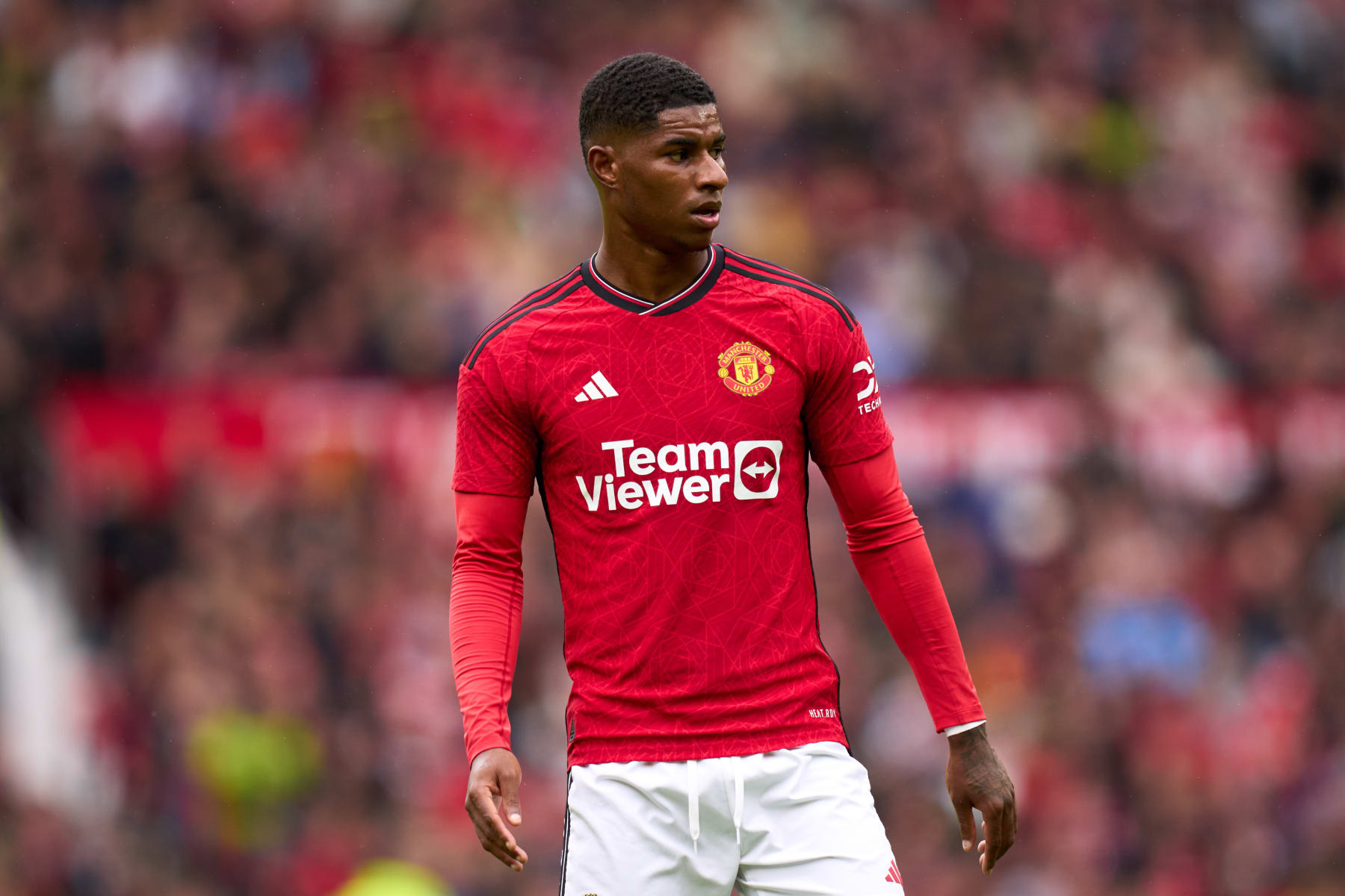 MANCHESTER, ENGLAND - AUGUST 05: Marcus Rashford of Manchester United looks on during the pre-season friendly match between Manchester United and RC Lens at Old Trafford on August 05, 2023 in Manchester, England. (Photo by Alex Caparros/Getty Images)