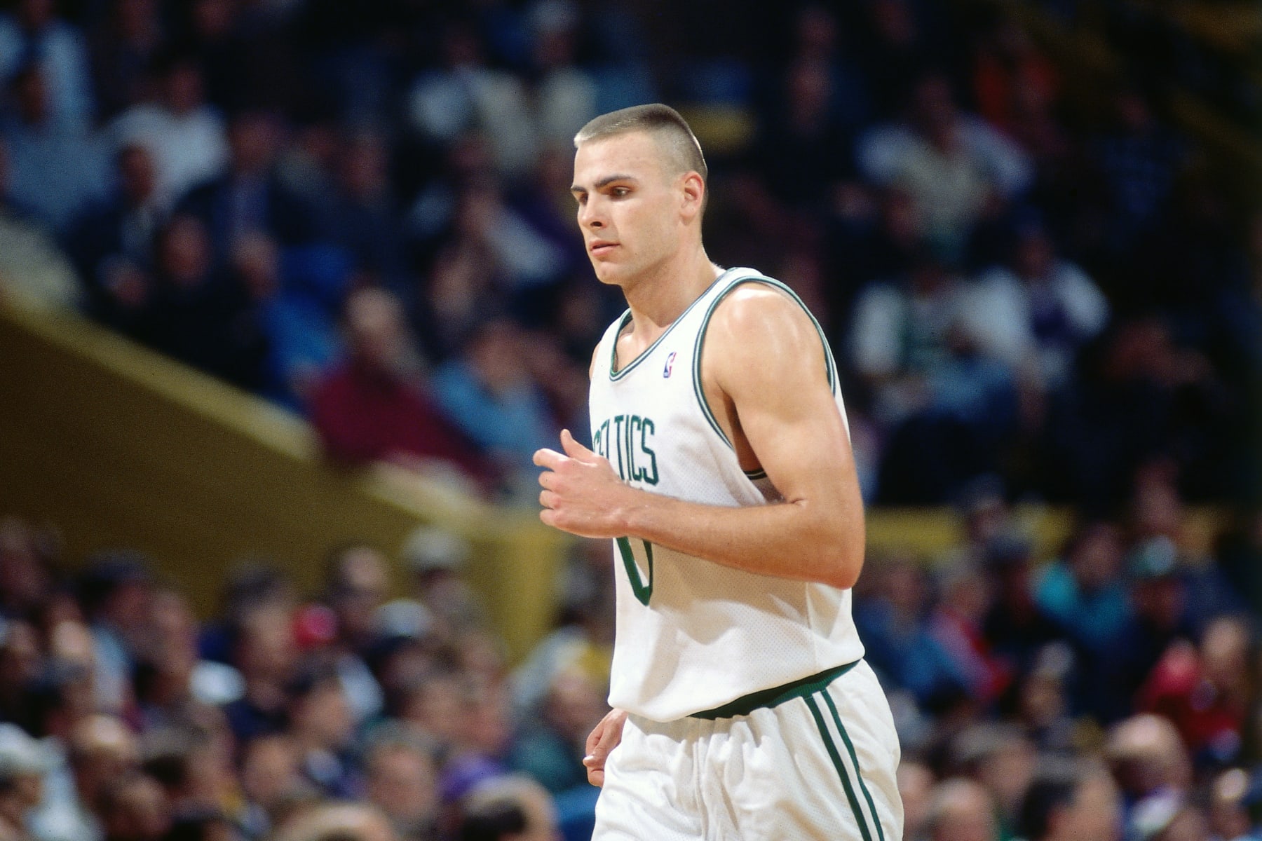 BOSTON, MA - 1995: Eric Montross #0 of the Boston Celtics runs down the court during a game played in 1995 against the Washington Bullets at the Boston Garden in Boston, Massachusetts. NOTE TO USER: User expressly acknowledges and agrees that, by downloading and/or using this Photograph, user is consenting to the terms and conditions of the Getty Images License Agreement. Mandatory Copyright Notice: Copyright 1995 NBAE (Photo by Dick Raphael/NBAE via Getty Images)