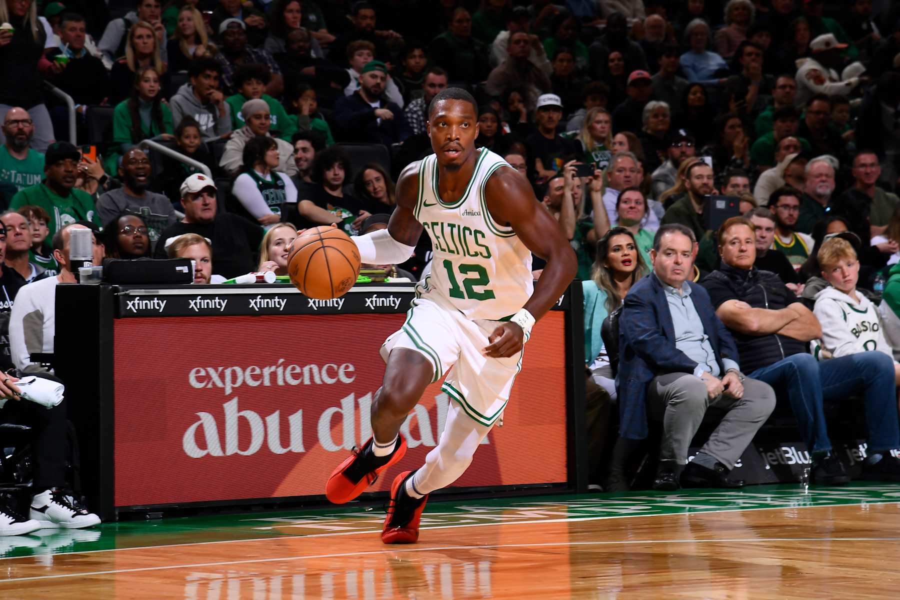 BOSTON, MA - OCTOBER 12: Lonnie Walker IV #12 of the Boston Celtics handles the ball during the game against the Philadelphia 76ers during a NBA Preseason game on October 12, 2024 at TD Garden in Boston, Massachusetts. NOTE TO USER: User expressly acknowledges and agrees that, by downloading and/or using this Photograph, user is consenting to the terms and conditions of the Getty Images License Agreement. Mandatory Copyright Notice: Copyright 2024 NBAE (Photo by Brian Babineau/NBAE via Getty Images)