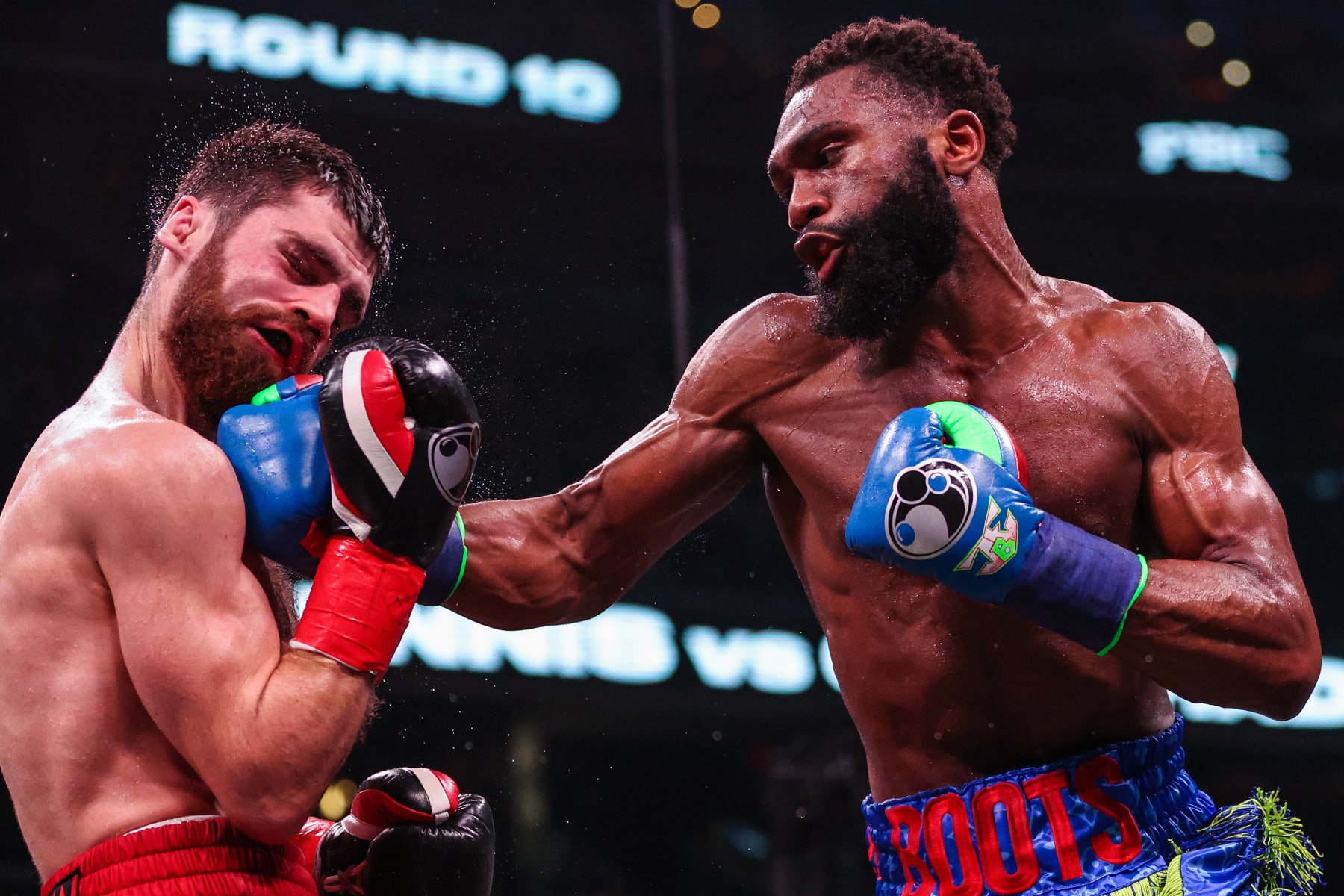 WASHINGTON, DC - JANUARY 07: Jaron Ennis punches Karen Chukhadzhian in their Interim IBF Welterweight Championship bout at Capital One Arena on January 7, 2023 in Washington, DC. (Photo by Patrick Smith/Getty Images)
