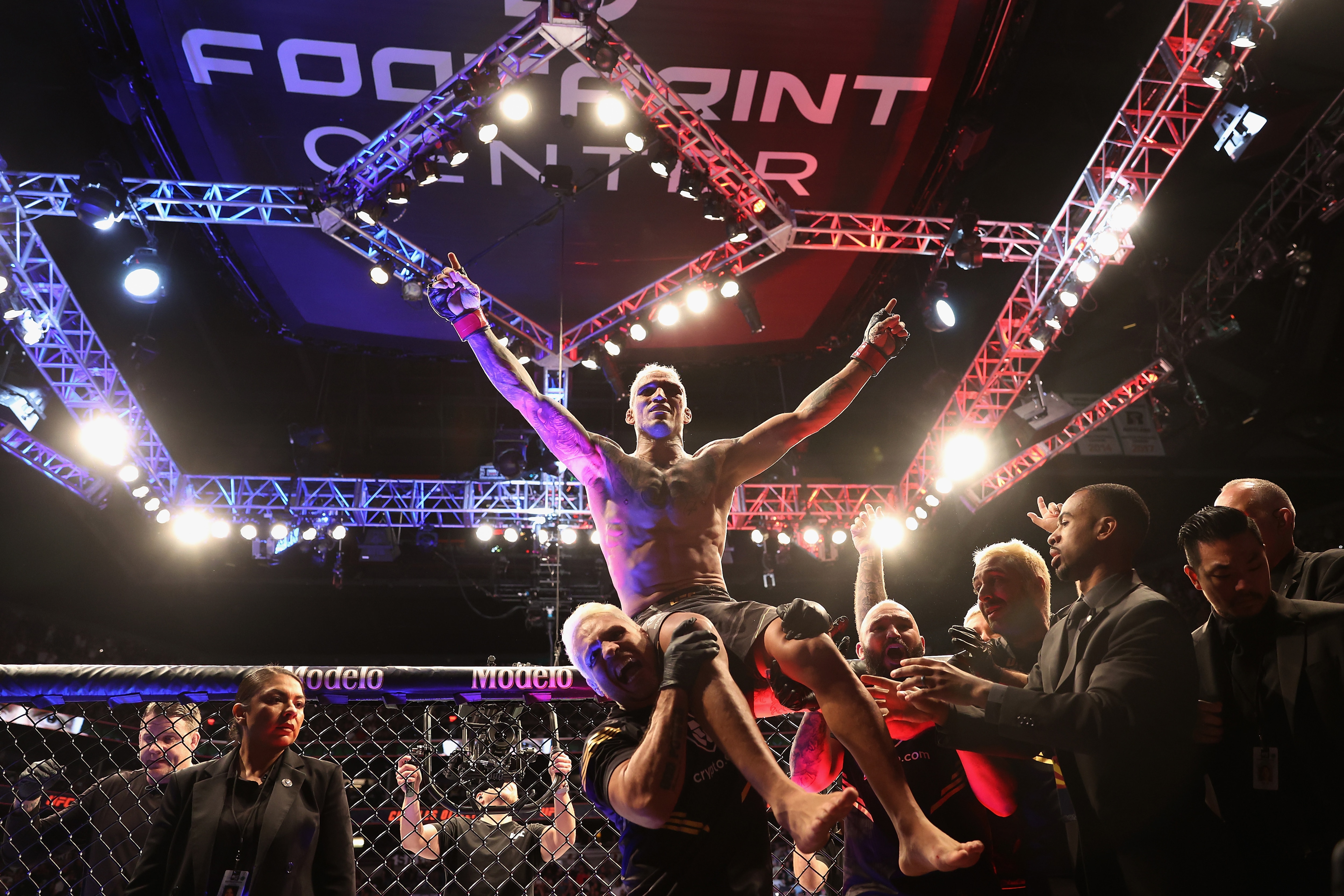 PHOENIX, ARIZONA - MAY 07: Charles Oliveira of Brazil celebrates after his submission victory over Justin Gaethje in their UFC lightweight championship bout during UFC 274 at Footprint Center on May 07, 2022 in Phoenix, Arizona. (Photo by Christian Petersen/Getty Images)