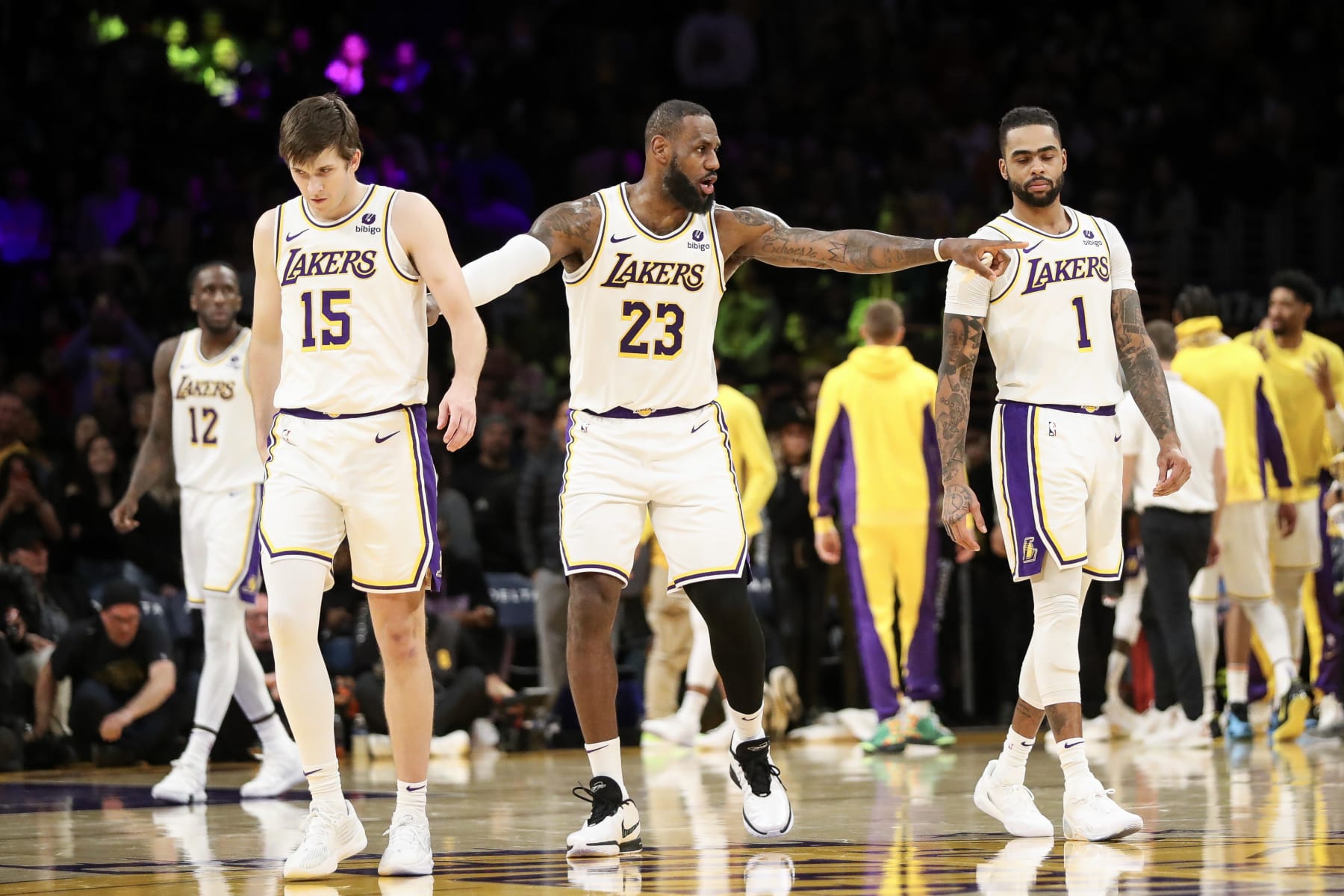 LOS ANGELES, CALIFORNIA - JANUARY 07: LeBron James #23 of the Los Angeles Lakers talks with Austin Reaves #15 and D'Angelo Russell #1 in the fourth quarter against the Los Angeles Clippers at Crypto.com Arena on January 07, 2024 in Los Angeles, California. NOTE TO USER: User expressly acknowledges and agrees that, by downloading and or using this photograph, User is consenting to the terms and conditions of the Getty Images License Agreement. (Photo by Meg Oliphant/Getty Images)