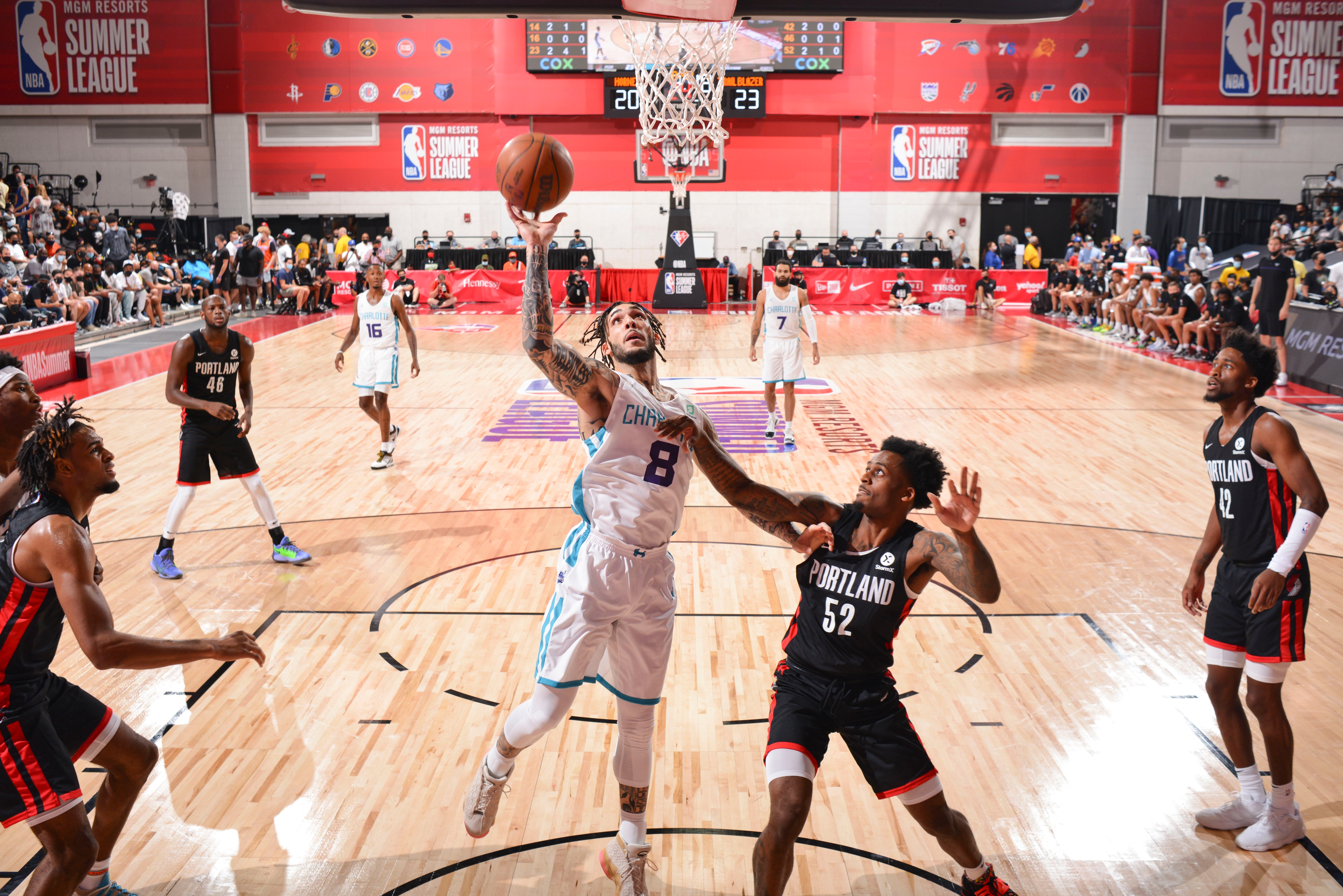 LAS VEGAS, NV - AUGUST 8: LiAngelo Ball #8 of Charlotte Hornets drives to the basket during the 2021 Las Vegas Summer League on August 8, 2021 at the Cox Pavilion in Las Vegas, Nevada. NOTE TO USER: User expressly acknowledges and agrees that, by downloading and/or using this Photograph, user is consenting to the terms and conditions of the Getty Images License Agreement. Mandatory Copyright Notice: Copyright 2021 NBAE (Photo by David Dow/NBAE via Getty Images)