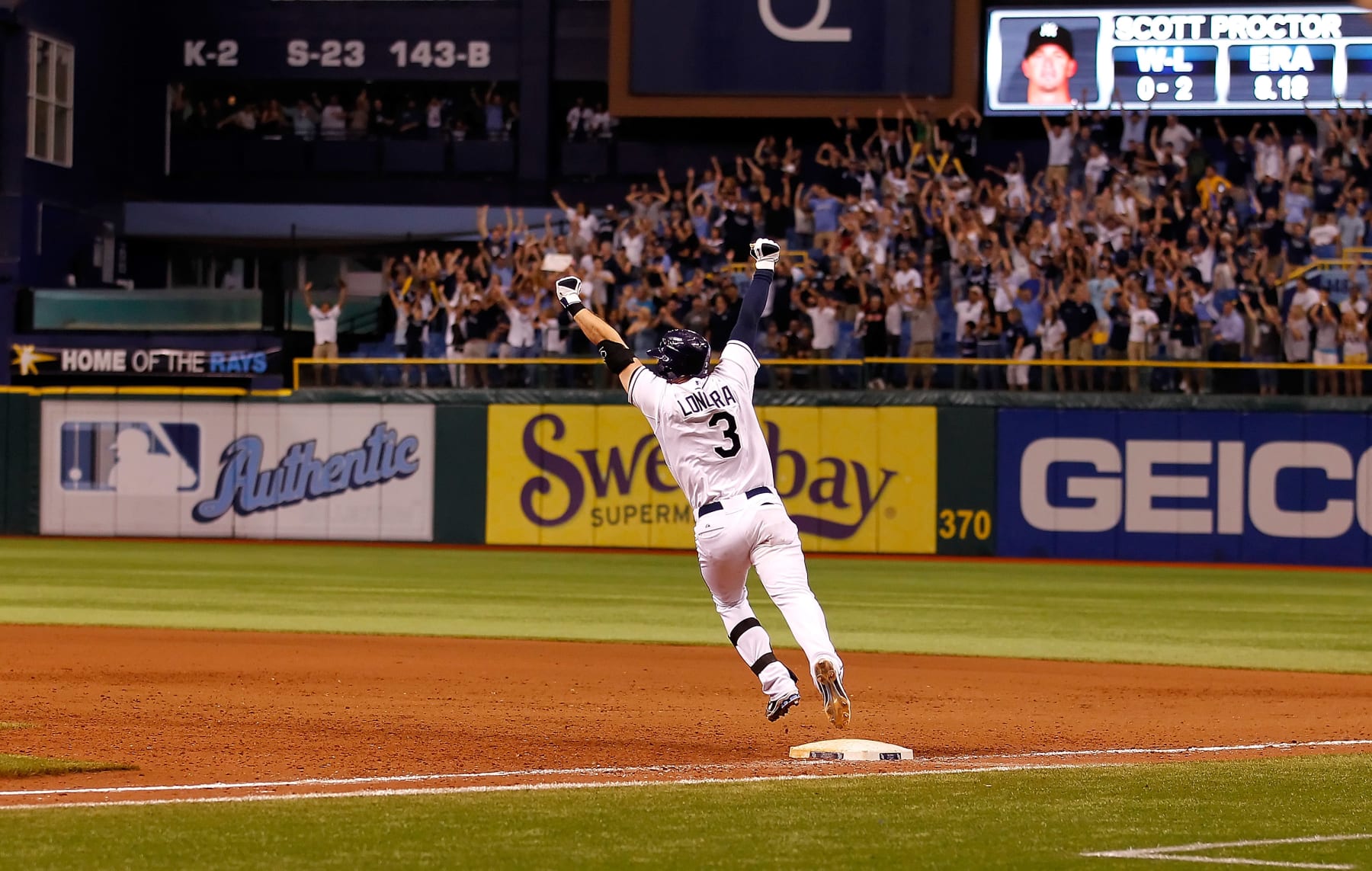 ST PETERSBURG, FL - SEPTEMBER 28:  Infielder Evan Longoria #3 of the Tampa Bay Rays rounds the bases after his bottom of the twelveth inning walk off home run against the New York Yankees during the game at Tropicana Field on September 28, 2011 in St. Petersburg, Florida.  (Photo by J. Meric/Getty Images)