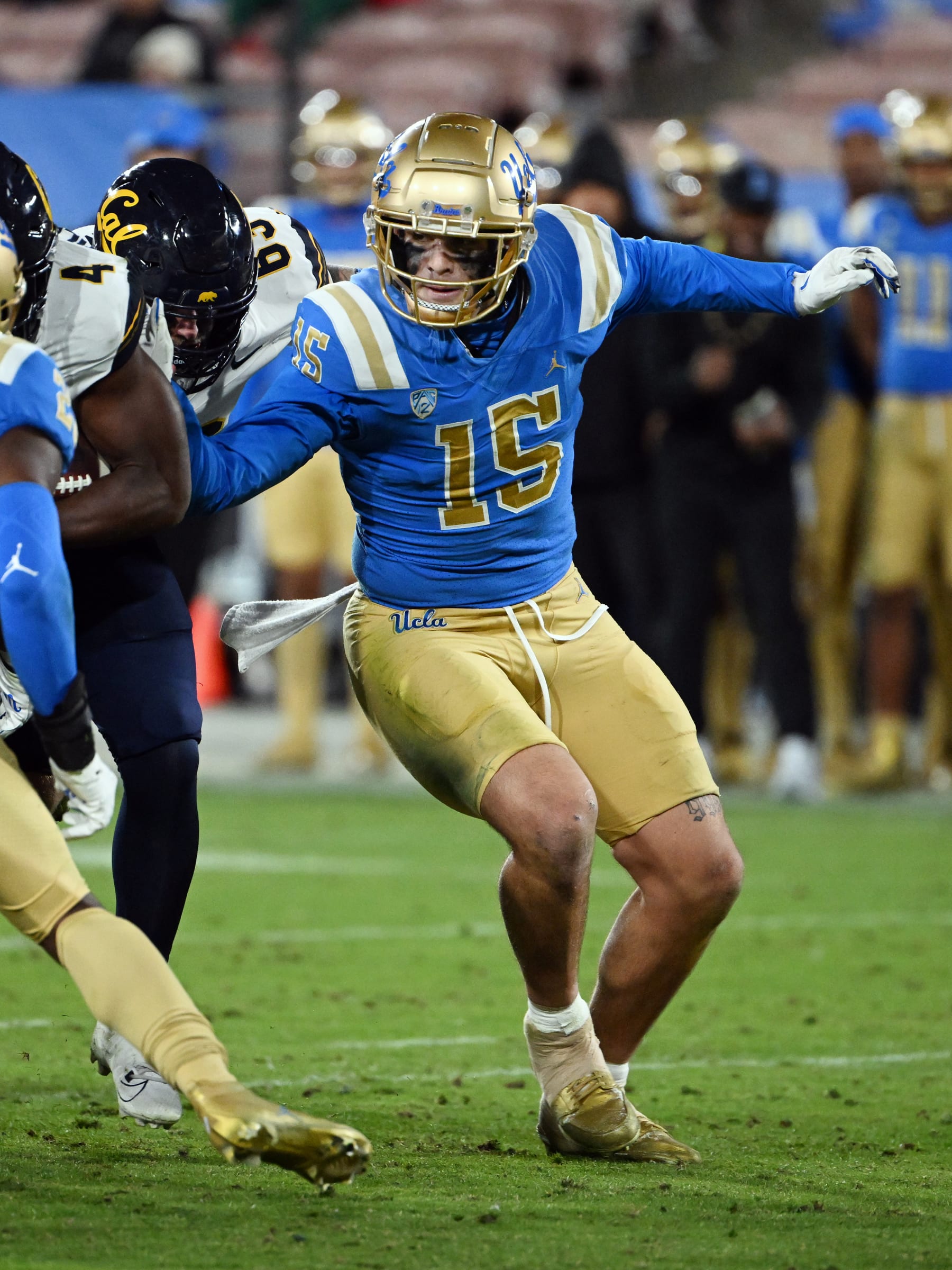 PASADENA, CA - NOVEMBER 25: UCLA Bruins defensive lineman Laiatu Latu (15) chases the runner during an NCAA football game against the California Golden Bears played on November 25, 2023 at the Rose Bowl in Pasadena, CA. (Photo by John Cordes/Icon Sportswire via Getty Images)