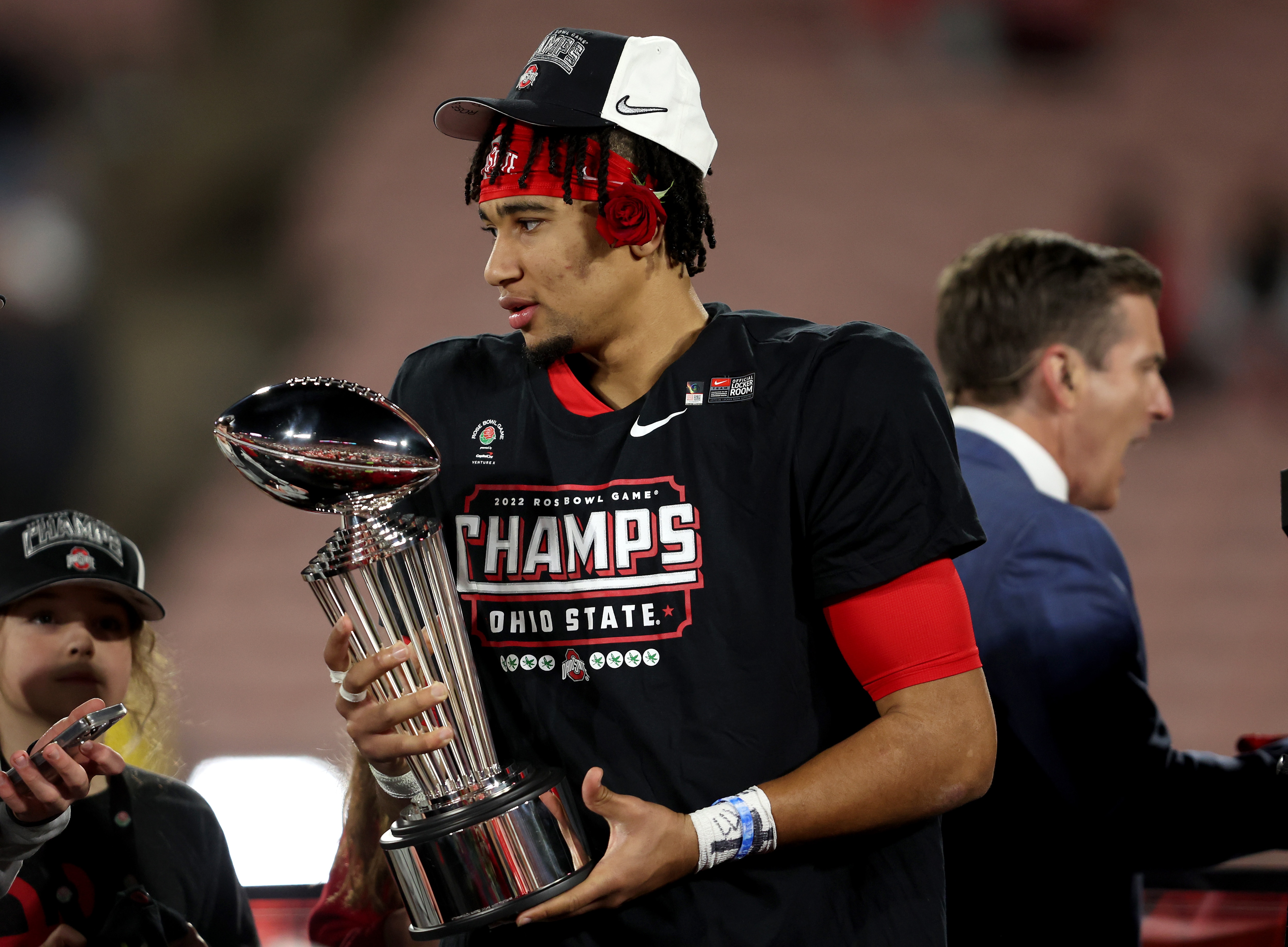 PASADENA, CALIFORNIA - JANUARY 01: C.J. Stroud #7 of the Ohio State Buckeyes celebrates with the trophy after defeating the Utah Utes 48-45 in the Rose Bowl Game at Rose Bowl Stadium on January 01, 2022 in Pasadena, California. (Photo by Sean M. Haffey/Getty Images)