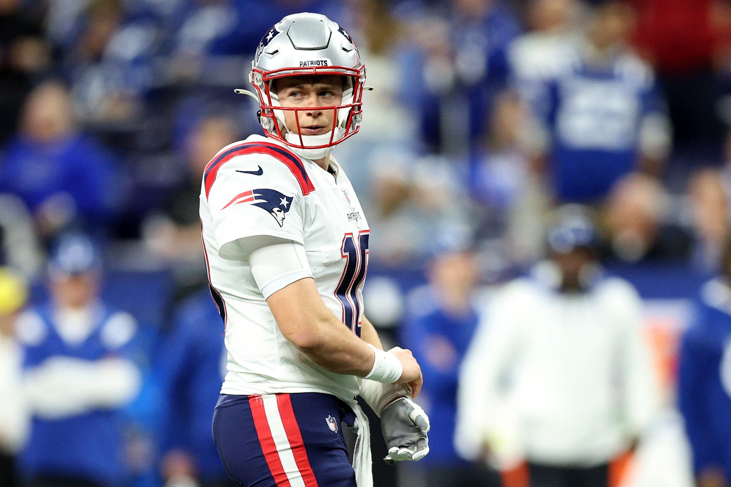 INDIANAPOLIS, INDIANA - DECEMBER 18: Mac Jones #10 of the New England Patriots looks on during the first half against the Indianapolis Colts at Lucas Oil Stadium on December 18, 2021 in Indianapolis, Indiana. (Photo by Andy Lyons/Getty Images)