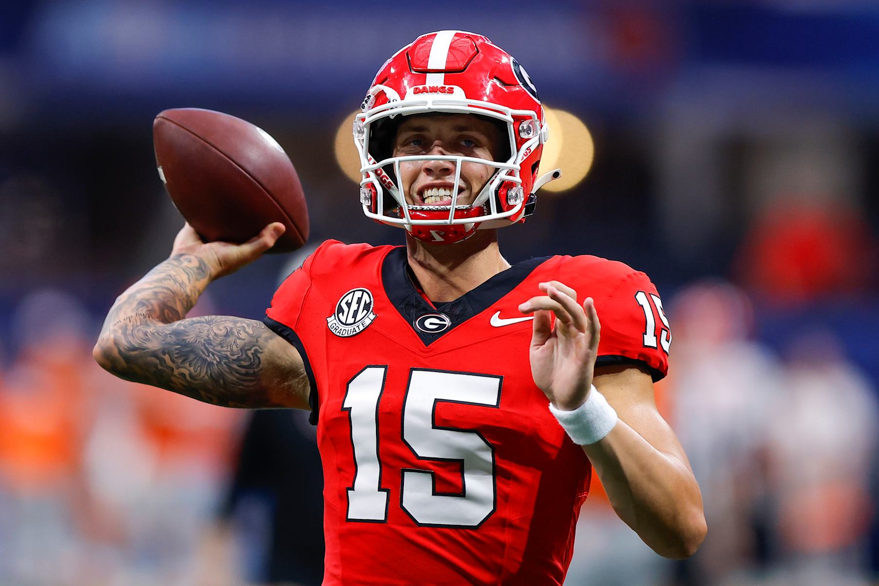 ATHENS, GEORGIA - AUGUST 31: Carson Beck #15 of the Georgia Bulldogs warms up prior to the game against the Clemson Tigers in the Aflac Kickoff Game at Mercedes-Benz Stadium on August 31, 2024 in Atlanta, Georgia.  (Photo by Todd Kirkland/Getty Images)