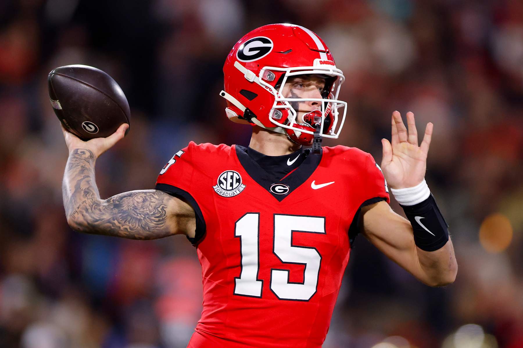 ATHENS, GEORGIA - NOVEMBER 29: Carson Beck #15 of the Georgia Bulldogs passes during the first quarter against the Georgia Tech Yellow Jackets at Sanford Stadium on November 29, 2024 in Athens, Georgia.  (Photo by Todd Kirkland/Getty Images)