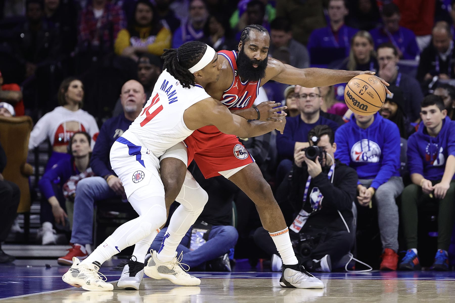 PHILADELPHIA, PENNSYLVANIA - DECEMBER 23: Terance Mann #14 of the LA Clippers guards James Harden #1 of the Philadelphia 76ers during the second quarter at Wells Fargo Center on December 23, 2022 in Philadelphia, Pennsylvania. NOTE TO USER: User expressly acknowledges and agrees that, by downloading and or using this photograph, User is consenting to the terms and conditions of the Getty Images License Agreement. (Photo by Tim Nwachukwu/Getty Images)