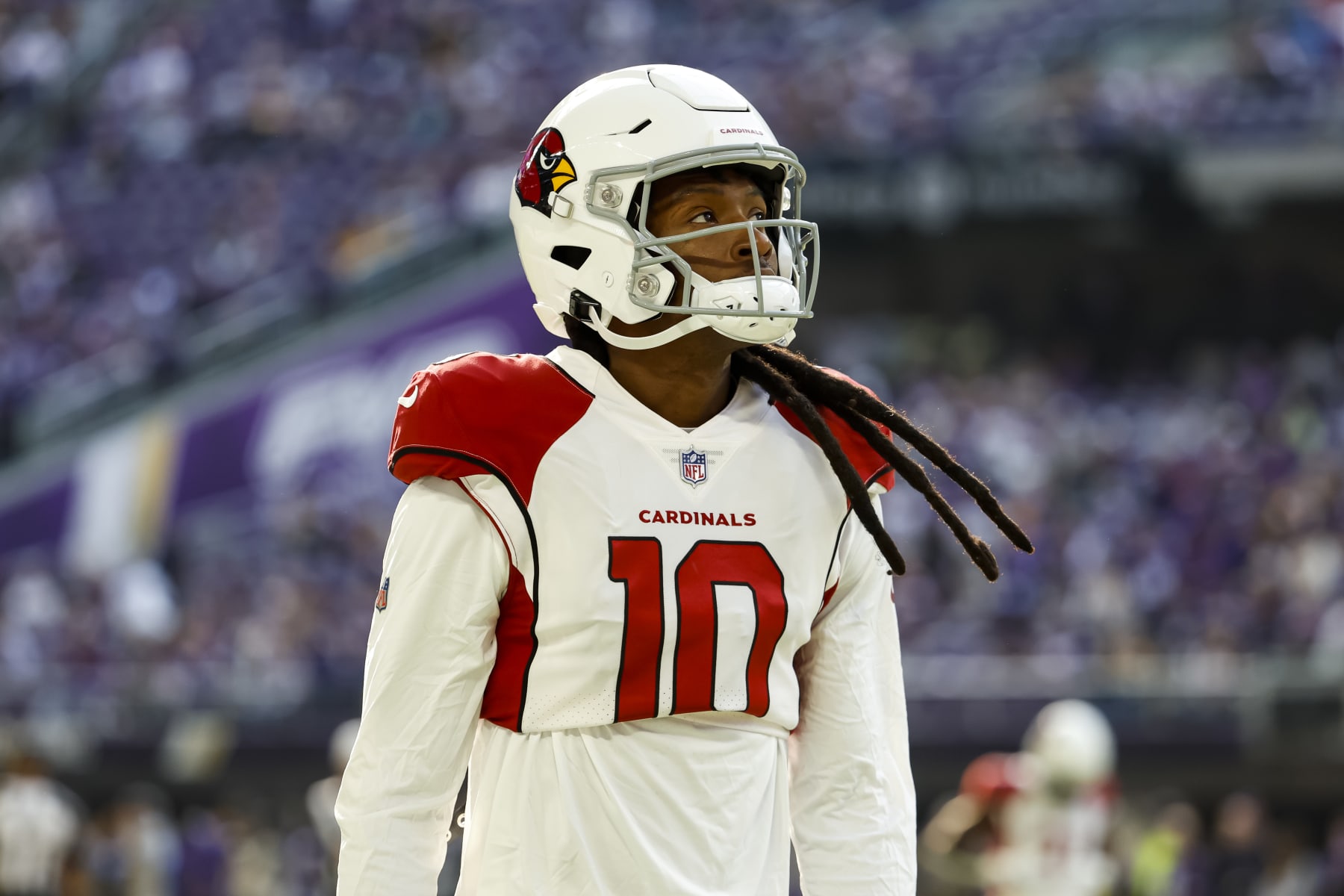 MINNEAPOLIS, MN - OCTOBER 30: DeAndre Hopkins #10 of the Arizona Cardinals looks on before the start of the game against the Minnesota Vikings at U.S. Bank Stadium on October 30, 2022 in Minneapolis, Minnesota. The Vikings defeated the Cardinals 34-26. (Photo by David Berding/Getty Images)