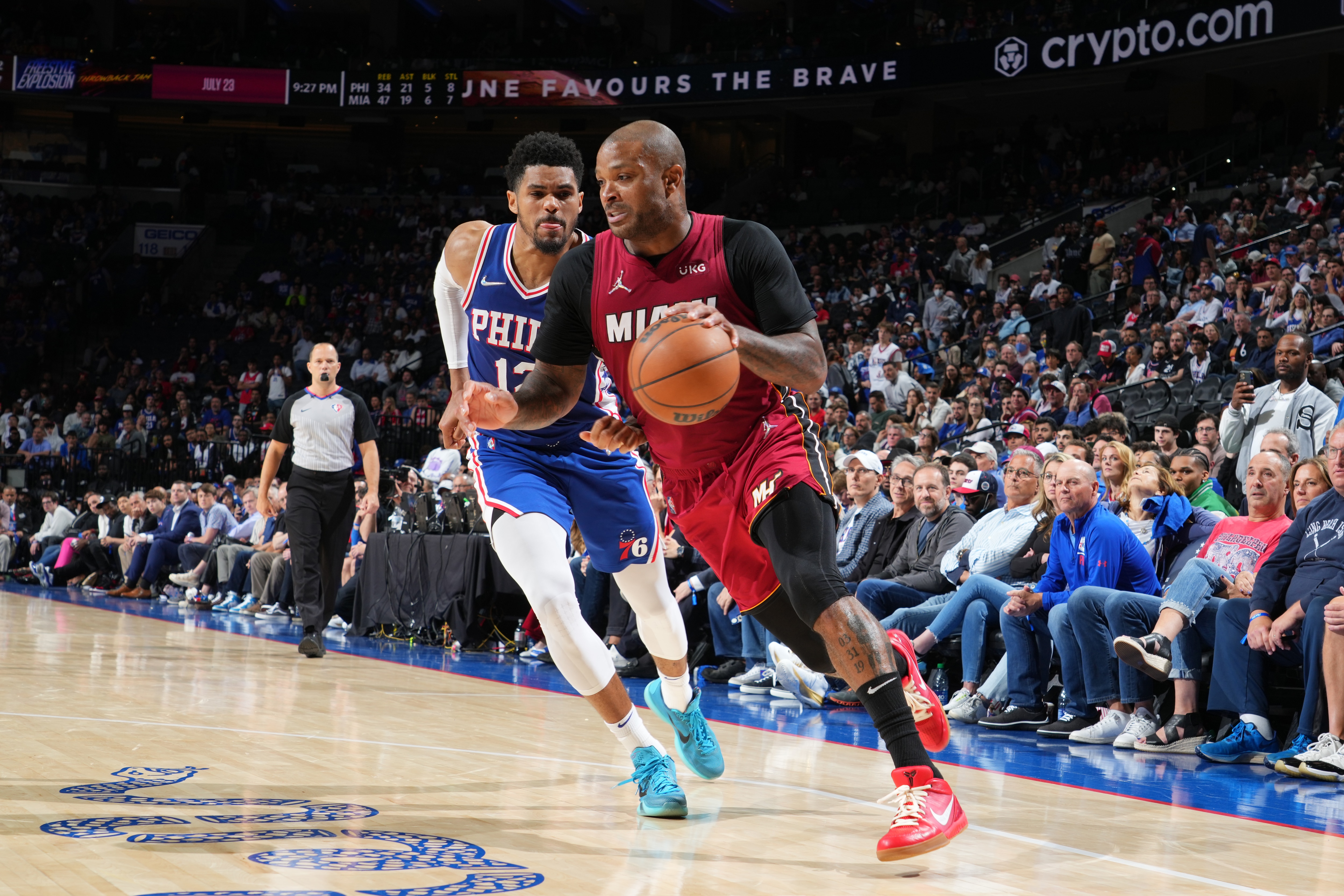 PHILADELPHIA, PA - MAY 12: P.J. Tucker #17 of the Miami Heat handles the ball against Tobias Harris #12 of the Philadelphia 76ers during Game 6 of the 2022 NBA Playoffs Eastern Conference Semifinals on May 12, 2022 at Wells Fargo Center in Philadelphia, Pennsylvania. NOTE TO USER: User expressly acknowledges and agrees that, by downloading and/or using this Photograph, user is consenting to the terms and conditions of the Getty Images License Agreement. Mandatory Copyright Notice: Copyright 2022 NBAE (Photo by Jesse D. Garrabrant/NBAE via Getty Images)