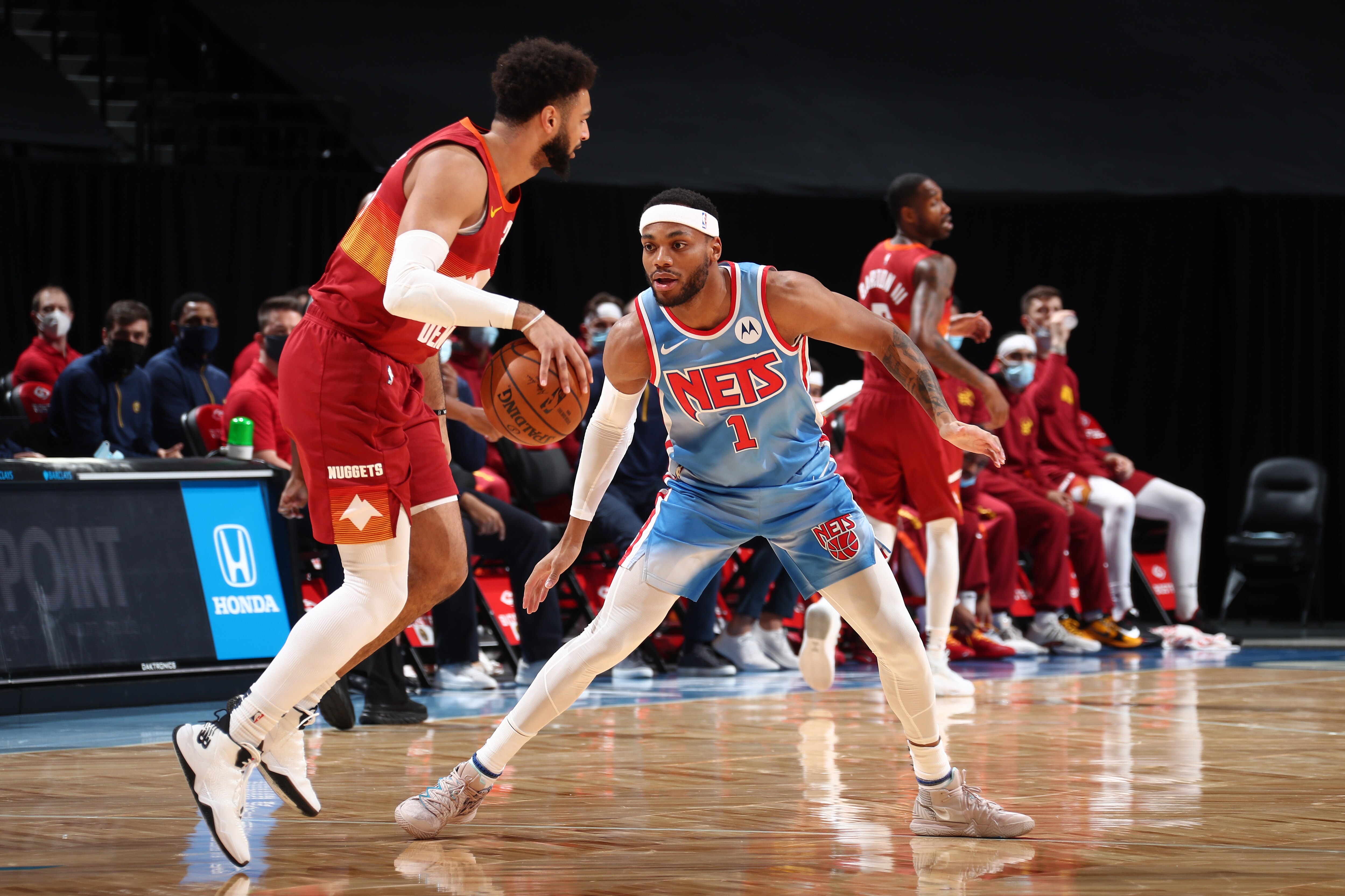 BROOKLYN, NY - JANUARY 12: Bruce Brown #1 of the Brooklyn Nets plays defense during the game against the Denver Nuggets on January 12, 2021 at Barclays Center in Brooklyn, New York. NOTE TO USER: User expressly acknowledges and agrees that, by downloading and or using this Photograph, user is consenting to the terms and conditions of the Getty Images License Agreement. Mandatory Copyright Notice: Copyright 2021 NBAE (Photo by Nathaniel S. Butler/NBAE via Getty Images)