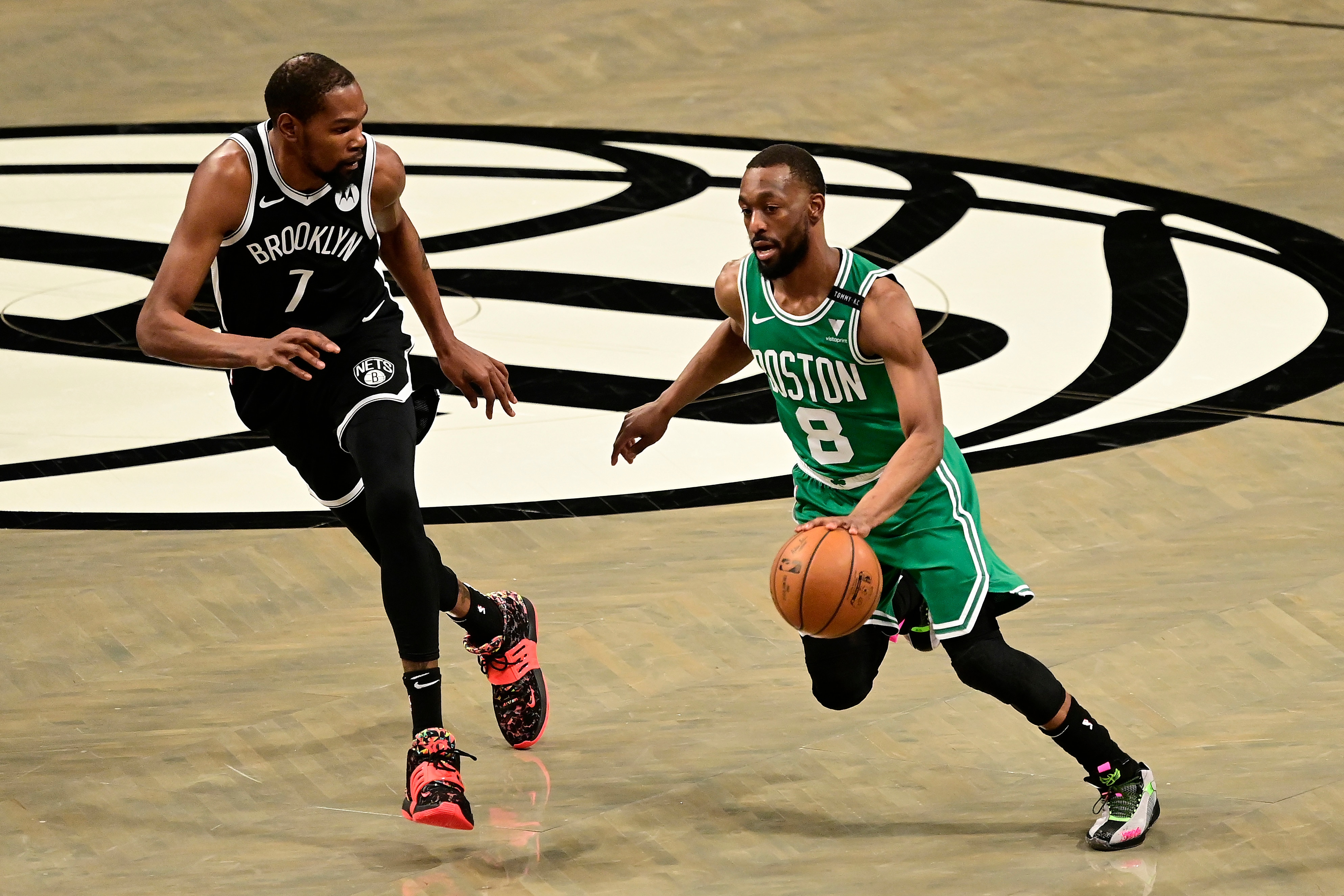 NEW YORK, NEW YORK - MAY 22:  Kemba Walker #8 of the Boston Celtics is defended by Kevin Durant #7 of the Brooklyn Nets in Game One of the First Round of the 2021 NBA Playoffs at Barclays Center at Barclays Center on May 22, 2021 in New York City. NOTE TO USER: User expressly acknowledges and agrees that, by downloading and or using this photograph, User is consenting to the terms and conditions of the Getty Images License Agreement.  (Photo by Steven Ryan/Getty Images)