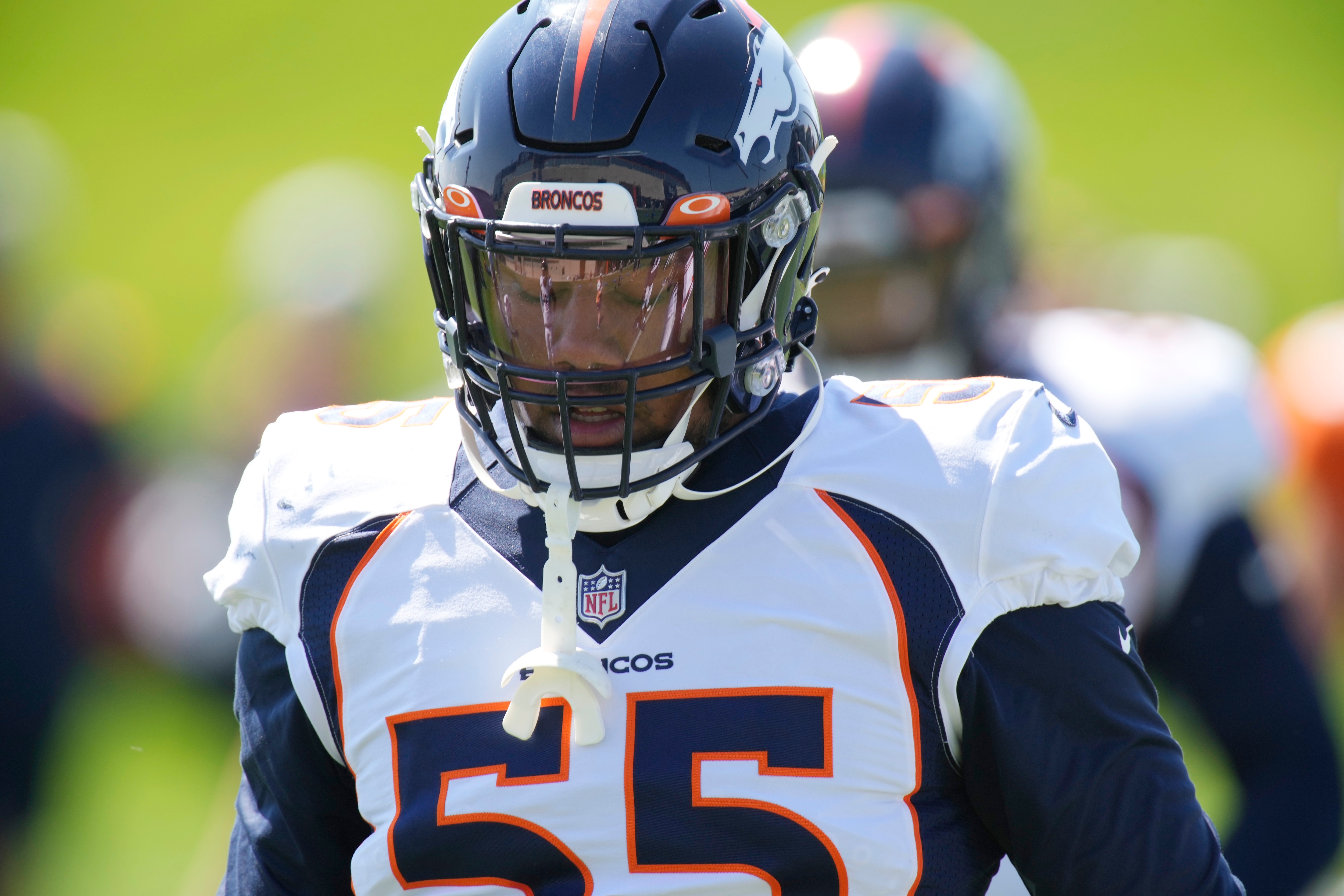 Denver Broncos outside linebacker Bradley Chubb (55) takes part in drills during an NFL football training practice at the team's headquarters Wednesday, Aug. 25, 2021, in Englewood, Colo. (AP Photo/David Zalubowski)