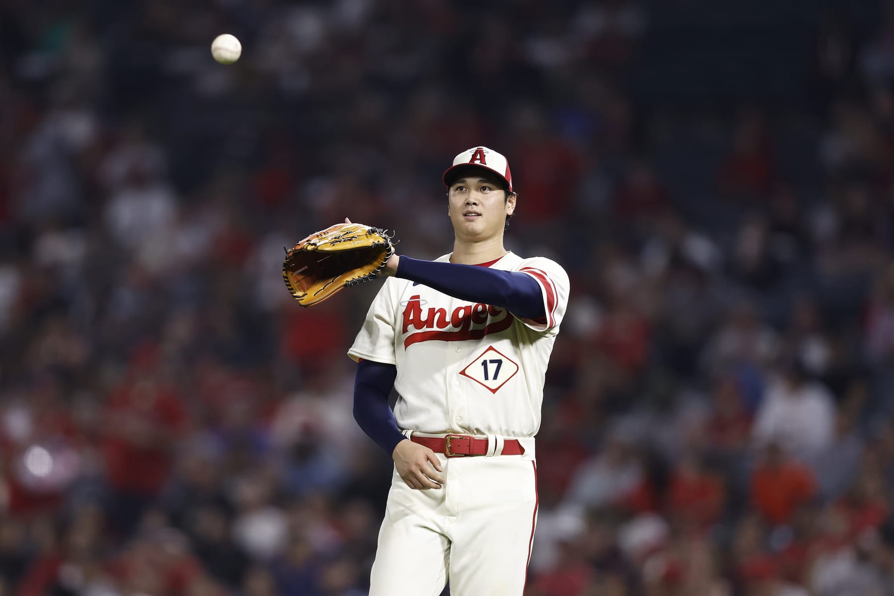 ANAHEIM, CALIFORNIA - SEPTEMBER 29: Shohei Ohtani #17 of the Los Angeles Angels makes a catch in between pitches during a game against the Oakland Athletics in the seventh inning at Angel Stadium of Anaheim on September 29, 2022 in Anaheim, California. (Photo by Michael Owens/Getty Images)