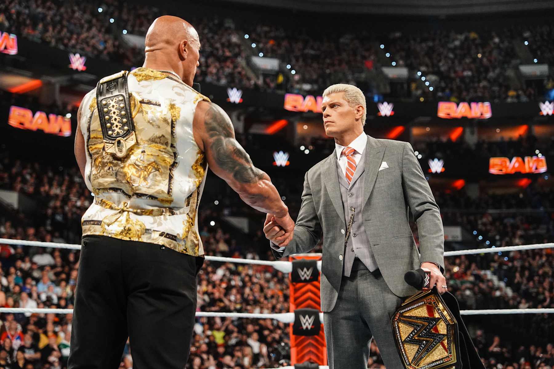 PHILADELPHIA, PENNSYLVANIA - APRIL 08: Dwayne "The Rock" Johnson stands in ring with Cody Rhodes at the Wells Fargo Center on April 8, 2024 in Philadelphia, Pennsylvania. (Photo by WWE/Getty Images)