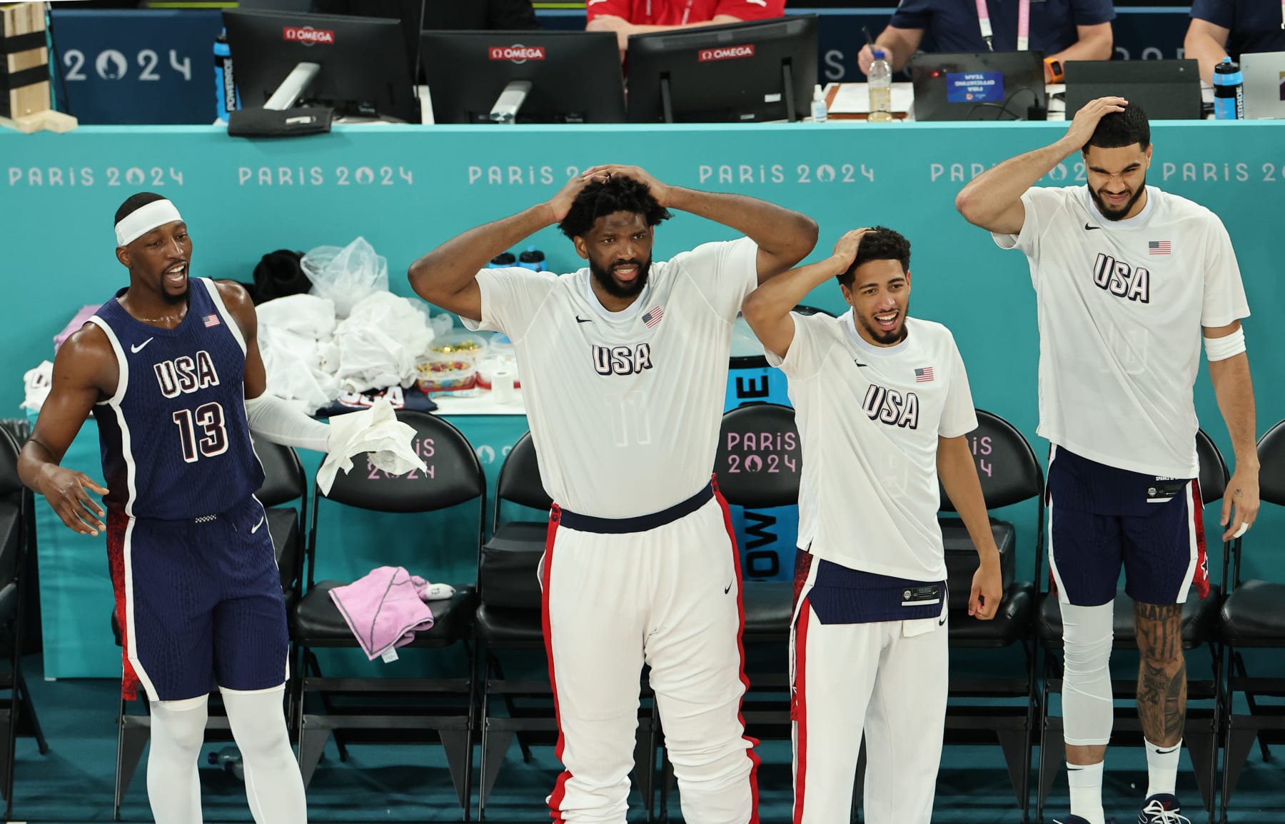 PARIS, FRANCE - AUGUST 06: Bam Adebayo #13, Joel Embiid #11, Tyrese Haliburton #9, and Jayson Tatum #10 of Team United States react from the bench during a Men's basketball quarterfinal game between Team United States and Team Brazil on day eleven of the Olympic Games Paris 2024 at Bercy Arena on August 06, 2024 in Paris, France. (Photo by Arturo Holmes/Getty Images) PARIS, FRANCE - AUGUST 06: Bam Adebayo #13, Joel Embiid #11, Tyrese Haliburton #9, and Jayson Tatum #10 of Team United States react from the bench during a Men's basketball quarterfinal game between Team United States and Team Brazil on day eleven of the Olympic Games Paris 2024 at Bercy Arena on August 06, 2024 in Paris, France. (Photo by Arturo Holmes/Getty Images)