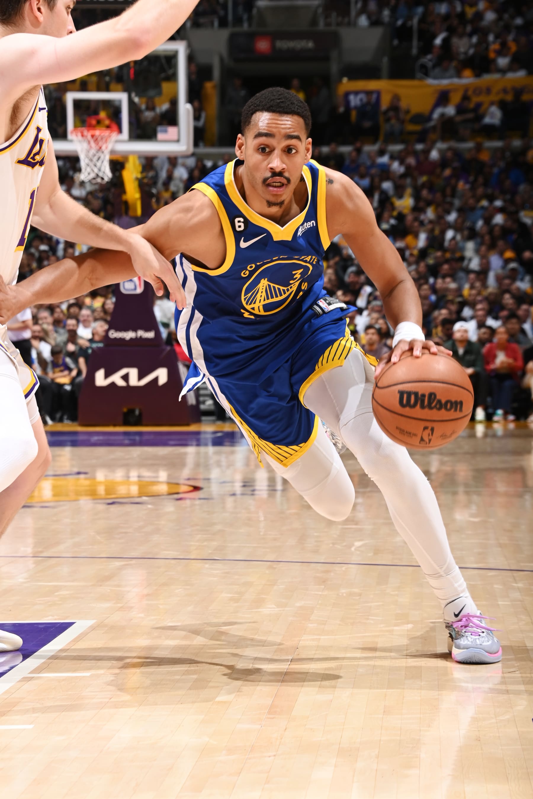LOS ANGELES, CA - MAY 6: Jordan Poole #3 of the Golden State Warriors drives to the basket during Round 2 Game 3 of the Western Conference Semi-Finals 2023 NBA Playoffs against the Los Angeles Lakers on May 6, 2023 at Crypto.Com Arena in Los Angeles, California. NOTE TO USER: User expressly acknowledges and agrees that, by downloading and/or using this Photograph, user is consenting to the terms and conditions of the Getty Images License Agreement. Mandatory Copyright Notice: Copyright 2023 NBAE (Photo by Andrew D. Bernstein/NBAE via Getty Images)