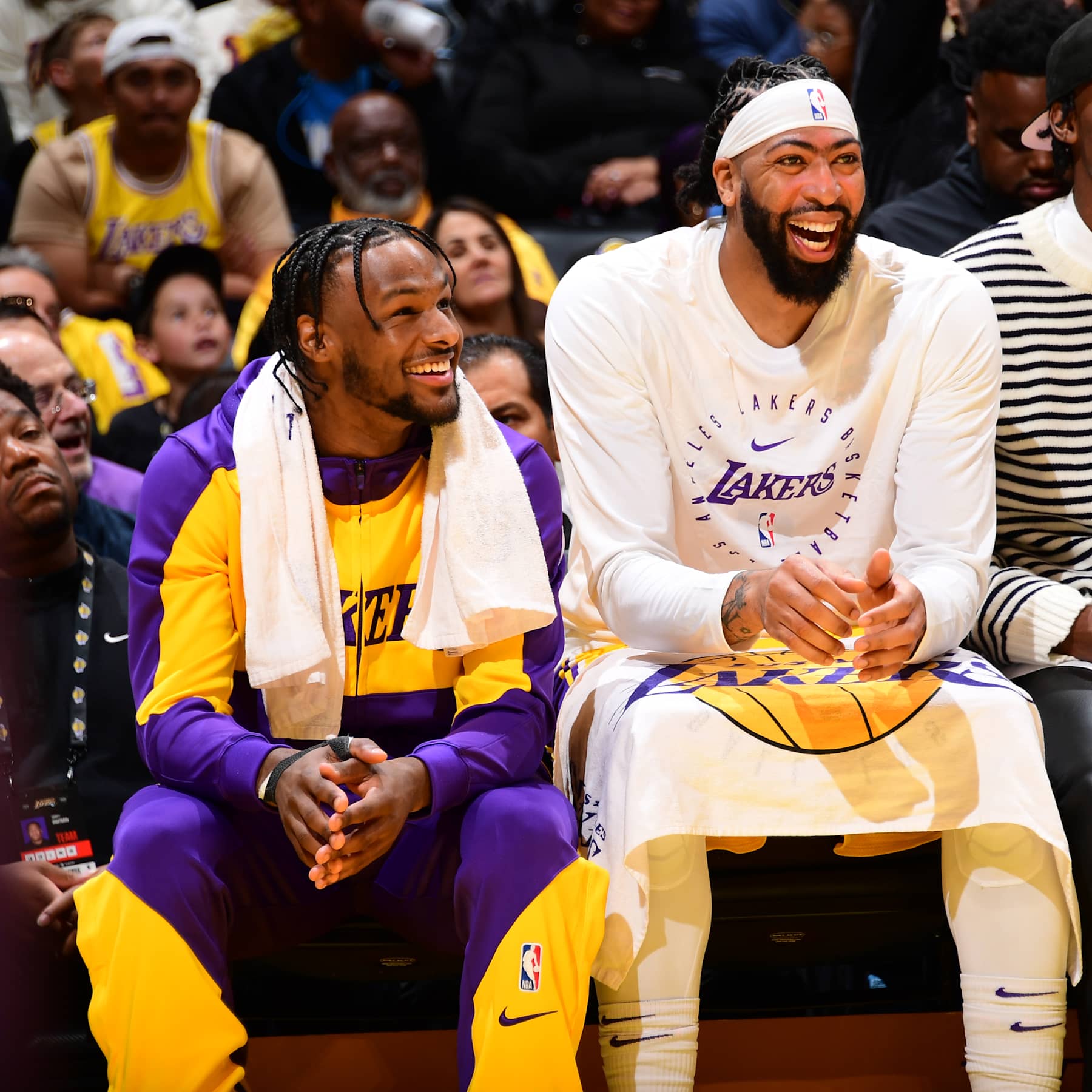 LOS ANGELES, CA - OCTOBER 22: Bronny James #9 and Anthony Davis #3 of the Los Angeles Lakers smile during the game against the Minnesota Timberwolves on October 22, 2024 at Crypto.Com Arena in Los Angeles, California. NOTE TO USER: User expressly acknowledges and agrees that, by downloading and/or using this Photograph, user is consenting to the terms and conditions of the Getty Images License Agreement. Mandatory Copyright Notice: Copyright 2024 NBAE (Photo by Adam Pantozzi/NBAE via Getty Images)
