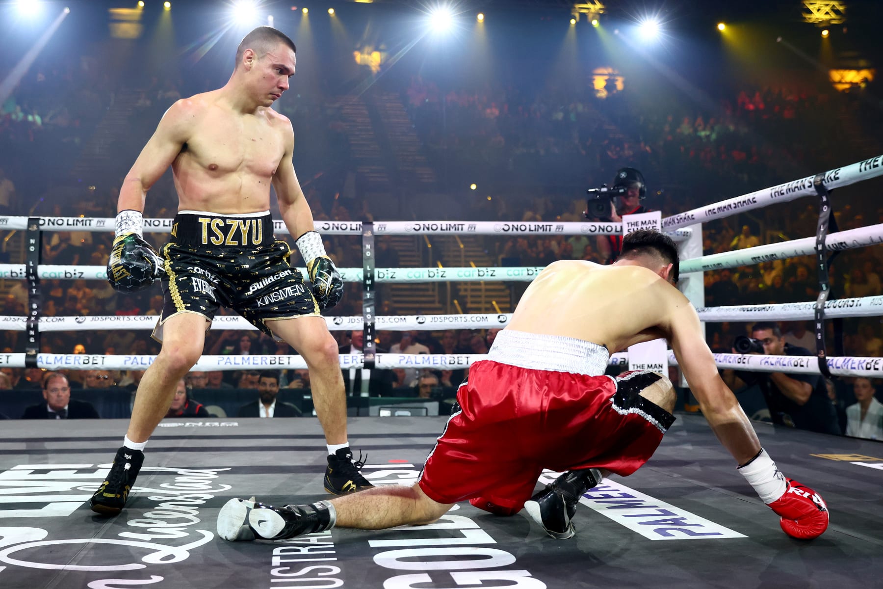 GOLD COAST, AUSTRALIA - JUNE 18: Carlos Ocampo falls to the ground after being punched by Tim Tszyu during the WBO Iterim Super-Welterwight title bout at Gold Coast Convention and Entertainment Centre on June 18, 2023 in Gold Coast, Australia. (Photo by Chris Hyde/Getty Images)