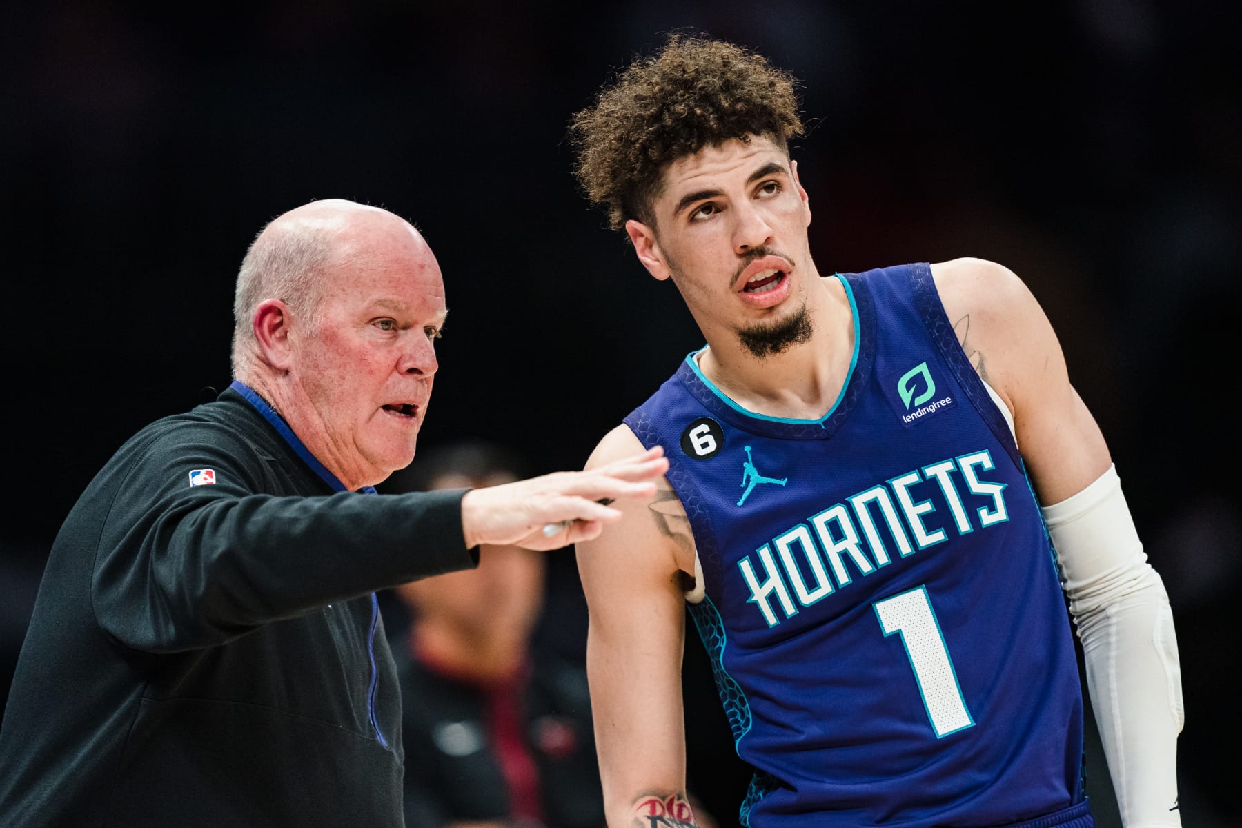 CHARLOTTE, NORTH CAROLINA - FEBRUARY 25: Head coach Steve Clifford of the Charlotte Hornets talks with LaMelo Ball #1 during their game against the Miami Heat at Spectrum Center on February 25, 2023 in Charlotte, North Carolina. NOTE TO USER: User expressly acknowledges and agrees that, by downloading and or using this photograph, User is consenting to the terms and conditions of the Getty Images License Agreement. (Photo by Jacob Kupferman/Getty Images)