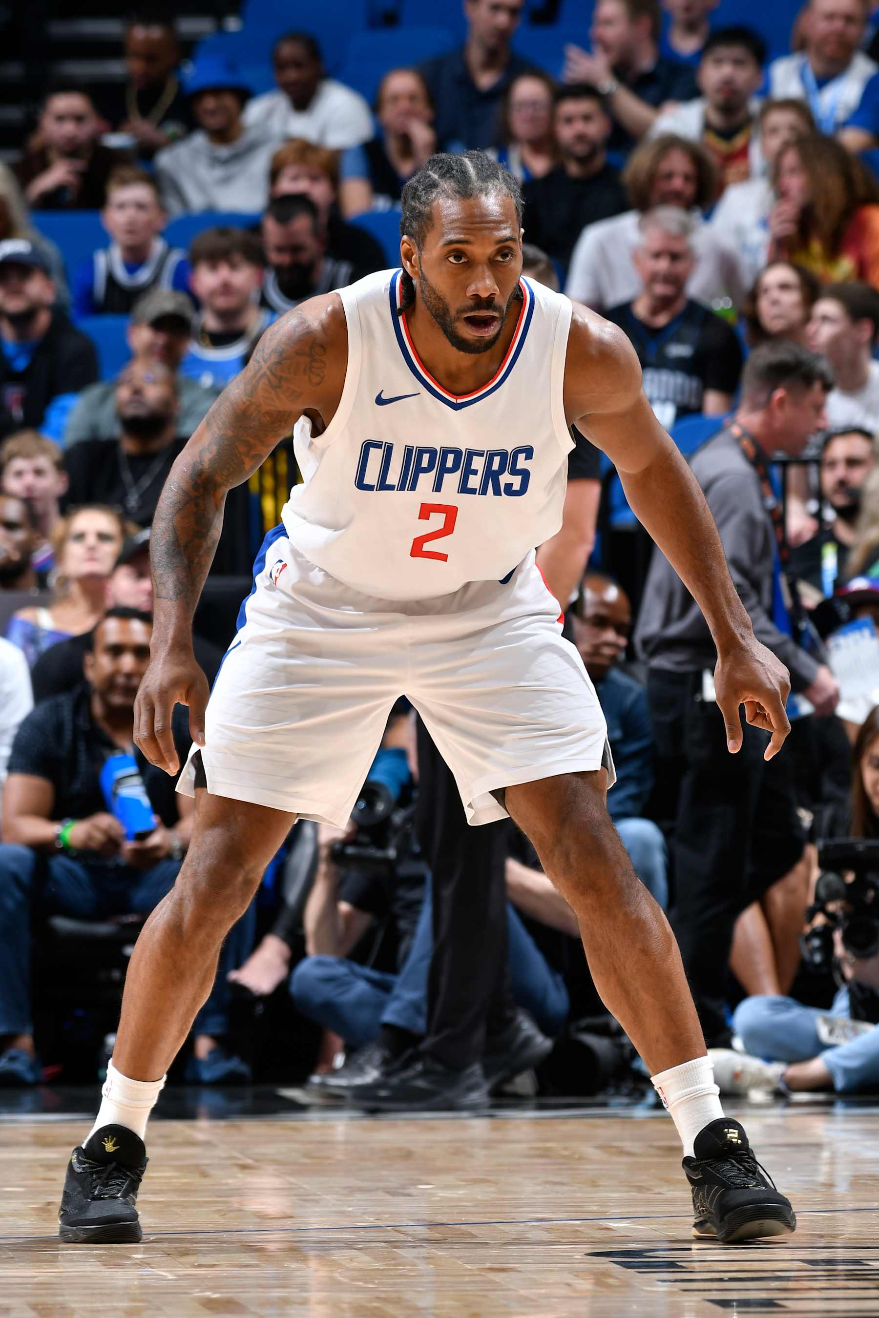 ORLANDO, FL - MARCH 29: Kawhi Leonard #2 of the LA Clippers plays defense against the Orlando Magic on March 29, 2024 at the Kia Center in Orlando, Florida. NOTE TO USER: User expressly acknowledges and agrees that, by downloading and or using this photograph, User is consenting to the terms and conditions of the Getty Images License Agreement. Mandatory Copyright Notice: Copyright 2024 NBAE (Photo by Fernando Medina/NBAE via Getty Images)