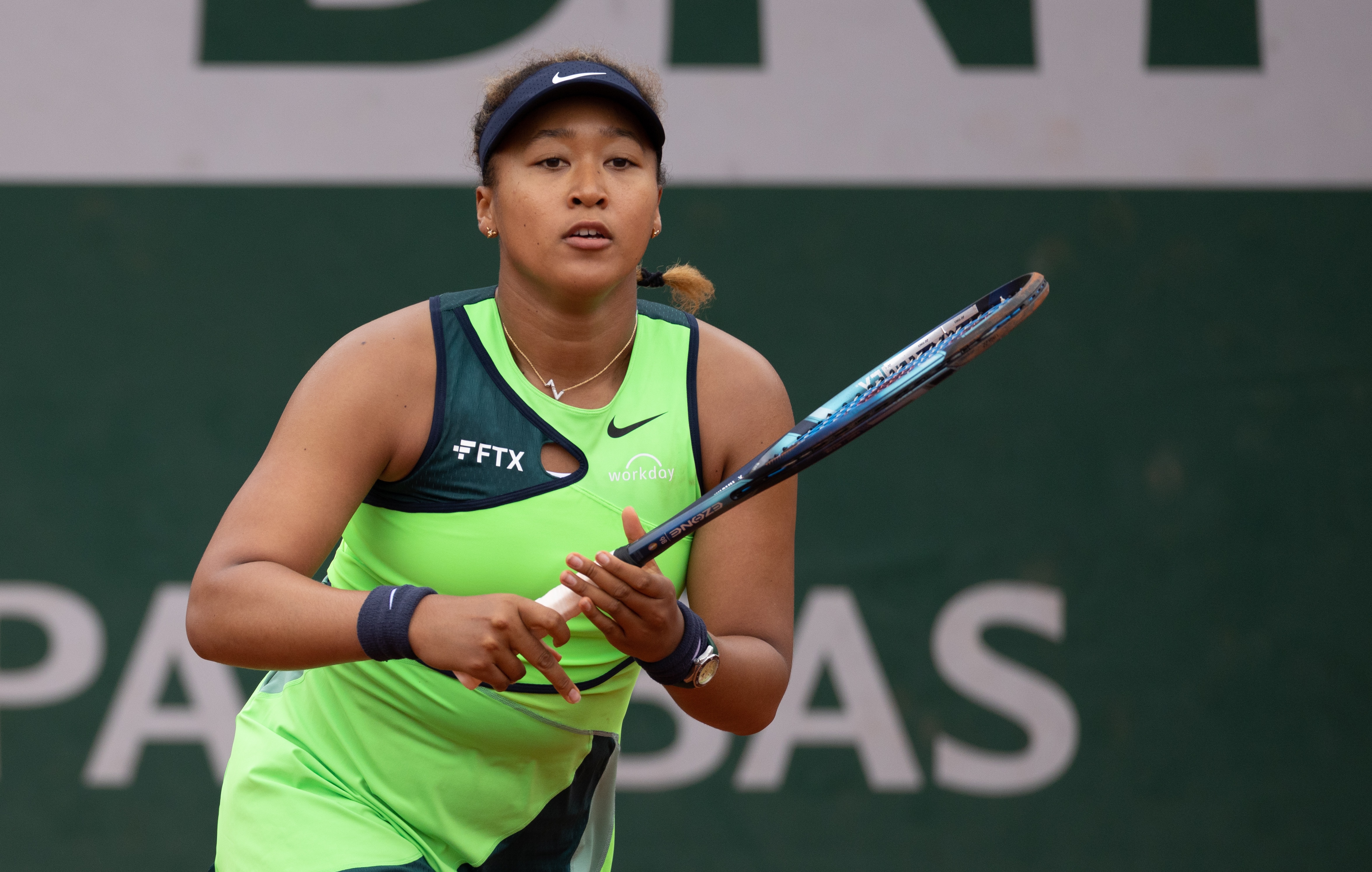 PARIS, FRANCE - MAY 23: Naomi Osaka of Japan vs Amanda Anisimova of USA during the Women's Singles First Round match on Day 2 of The 2022 French Open at Roland Garros on May 23, 2022 in Paris, France. (Photo by Tnani Badreddine/DeFodi Images via Getty Images )