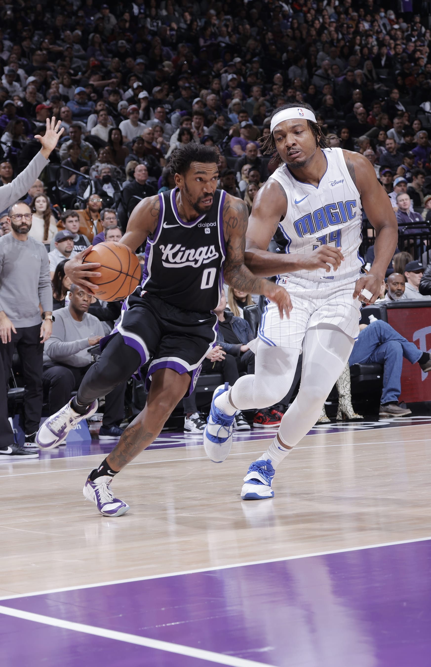 SACRAMENTO, CA - JANUARY 3: Malik Monk #0 of the Sacramento Kings drives to the basket during the game against the Orlando Magic on January 3, 2024 at Golden 1 Center in Sacramento, California. NOTE TO USER: User expressly acknowledges and agrees that, by downloading and or using this photograph, User is consenting to the terms and conditions of the Getty Images Agreement. Mandatory Copyright Notice: Copyright 2024 NBAE (Photo by Rocky Widner/NBAE via Getty Images)