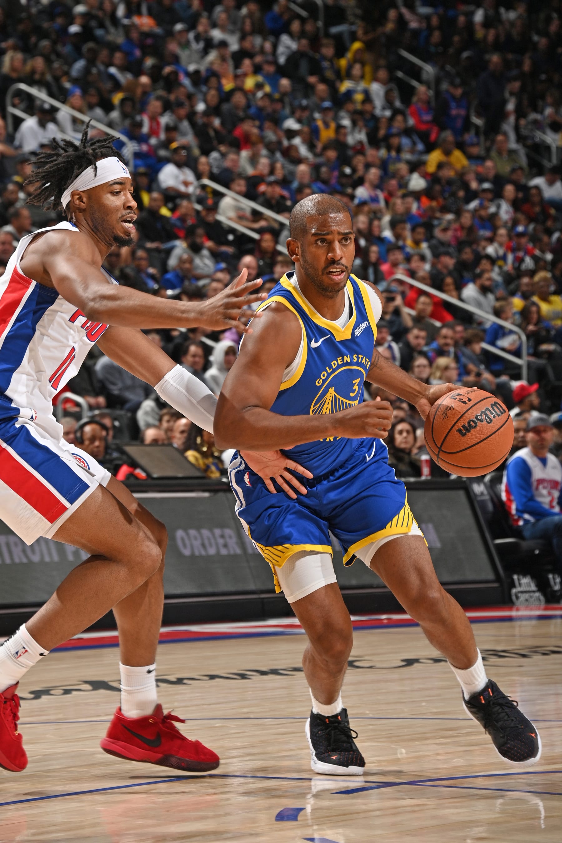 DETROIT, MI - NOVEMBER 6: Chris Paul #3 of the Golden State Warriors dribbles the ball during the game against the Detroit Pistons on November 6, 2023 at Little Caesars Arena in Detroit, Michigan. NOTE TO USER: User expressly acknowledges and agrees that, by downloading and/or using this photograph, User is consenting to the terms and conditions of the Getty Images License Agreement. Mandatory Copyright Notice: Copyright 2023 NBAE (Photo by Chris Schwegler/NBAE via Getty Images)