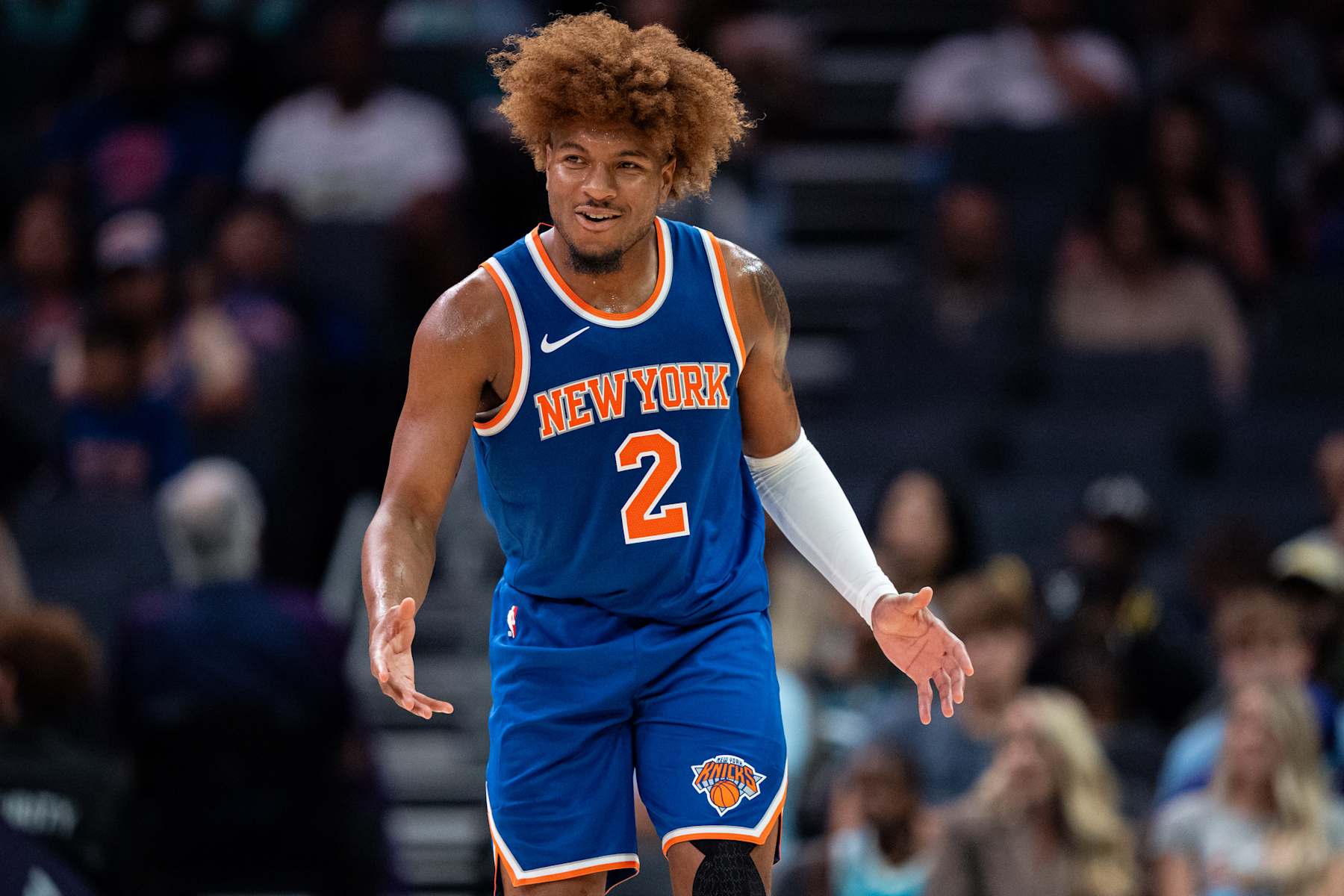 CHARLOTTE, NORTH CAROLINA - OCTOBER 06: Miles McBride #2 of the New York Knicks looks on in the third quarter during a preseason game against the Charlotte Hornets at Spectrum Center on October 06, 2024 in Charlotte, North Carolina. NOTE TO USER: User expressly acknowledges and agrees that, by downloading and or using this photograph, User is consenting to the terms and conditions of the Getty Images License Agreement. (Photo by Jacob Kupferman/Getty Images)